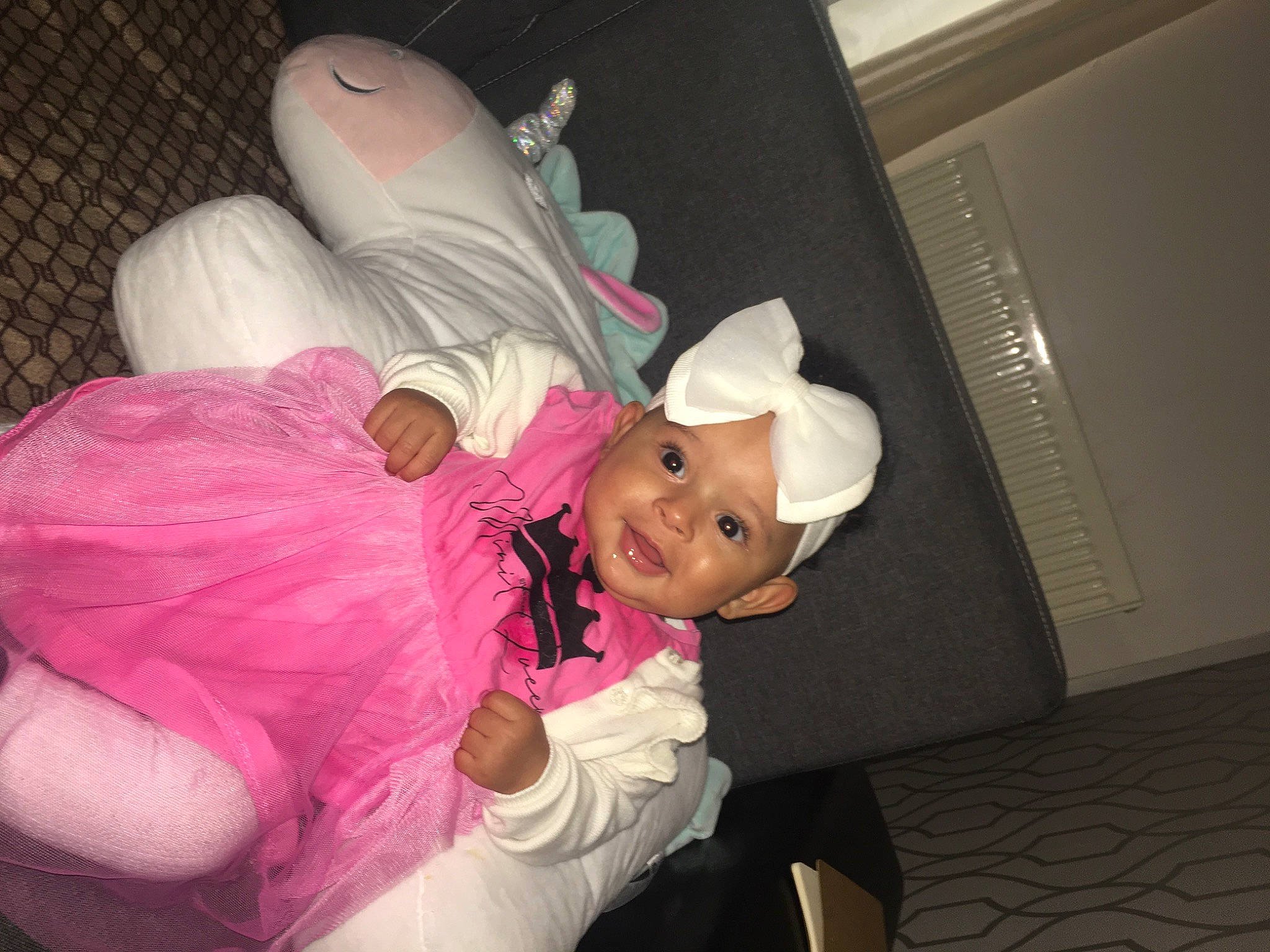 Cíara joined the competition — help win amazing prizes! baby, baby_toddler_clothing, child, comfort, event, fun, happy, hat, headgear, headwear, interaction, joy, magenta, person, pink, purple, room, smile, stuffed_toy, sun_hat