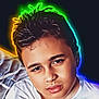 Manuel is registered to the contest to win money with this photo: child, boy, face, portrait, neon_glow, digital_art, hair, skin, young, white_shirt, closeup, expression, head, person, colorful, light_effect, background, dark, stylized, glow