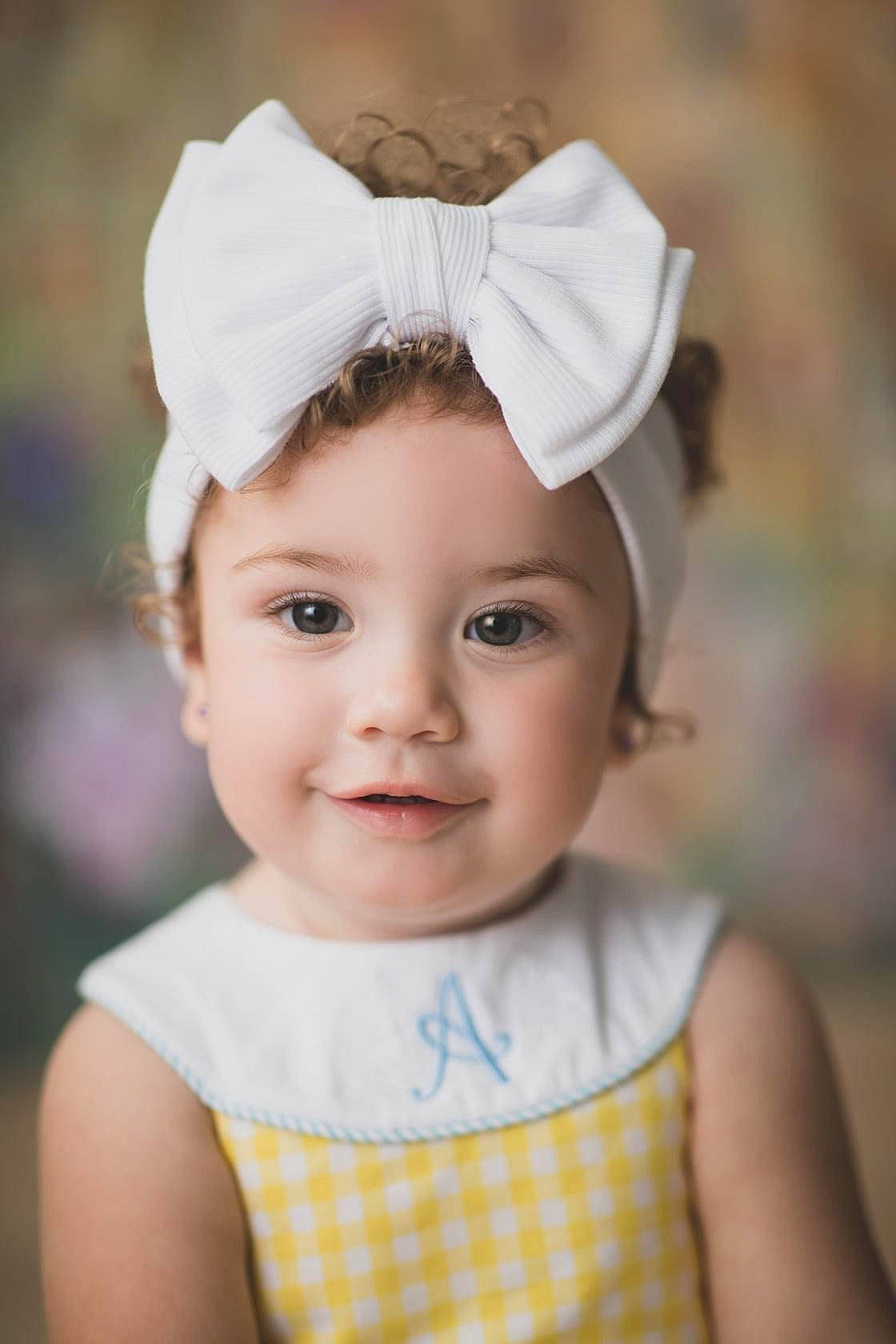 Aaliyah is registered to the contest to win money with this photo: baby, baby_toddler_clothing, cap, child, chin, costume_hat, eyelash, face, flash_photography, grass, happy, hat, headpiece, headwear, joy, lip, person, pink, skin, sleeve