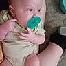 Jasper joined the competition — help win amazing prizes! baby, infant, pacifier, onesie, child, person, skin, hand, face, blue_eyes, sitting, adult_lap, fabric, quilted_surface, casual, indoor, closeup, comfort, relaxation, cute