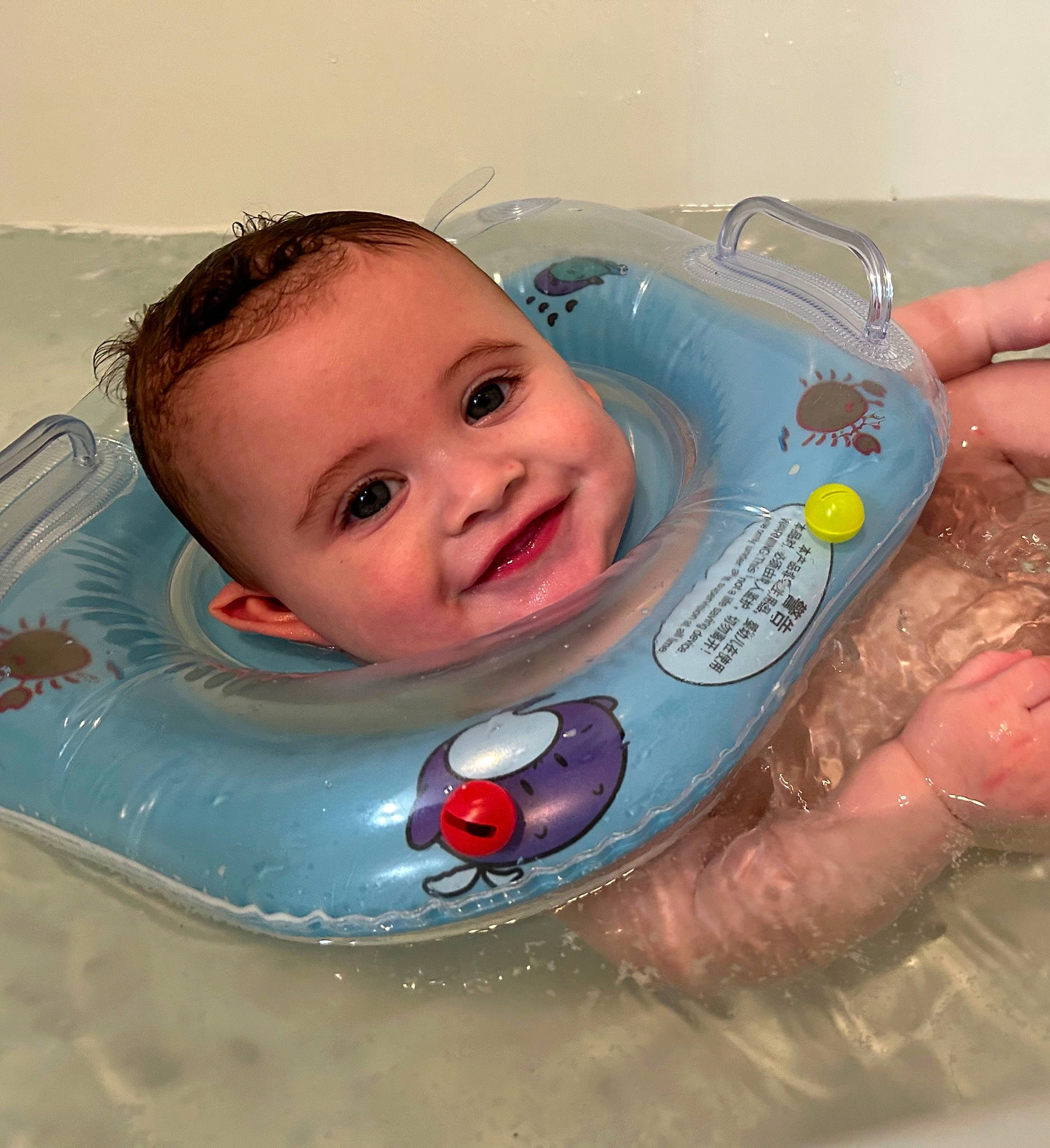 Kylan joined the competition — help win amazing prizes! baby, baby_bathing, baby_float, baby_laughing, baby_playing_with_toys, baby_products, baby_toys, bath_toy, bathing, cheek, child, facial_expression, fluid, fun, happy, joy, leisure, liquid, person, smile