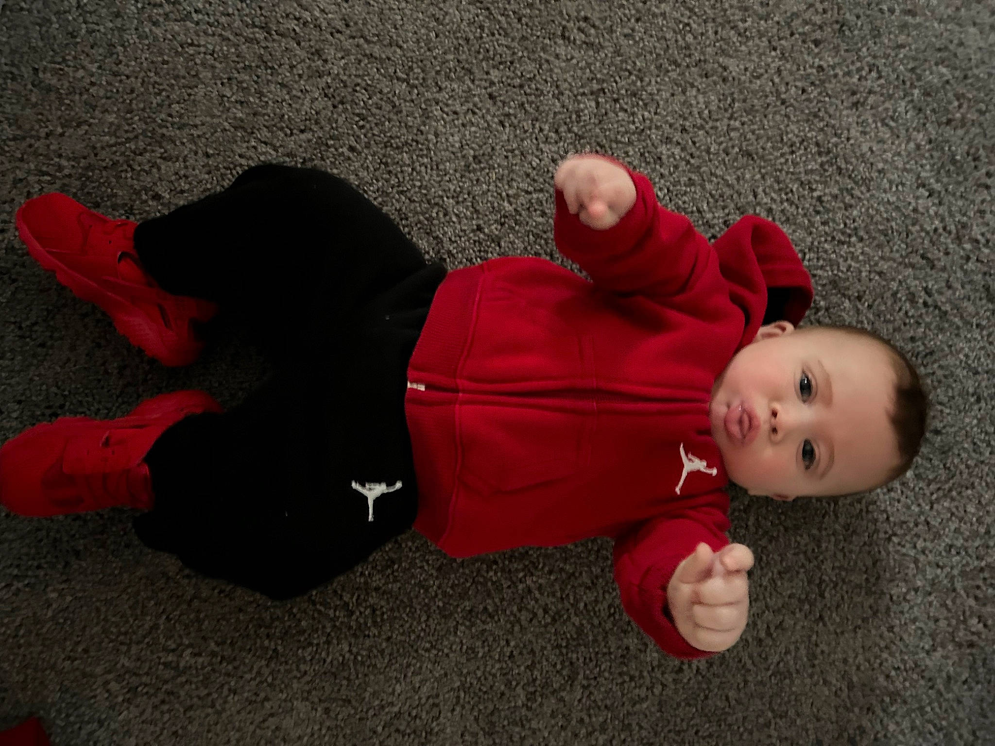 Kylan joined the competition — help win amazing prizes! baby, baby_toddler_clothing, carmine, child, comfort, floor, flooring, fun, grass, hat, knee, person, play, sitting, toddler, wood