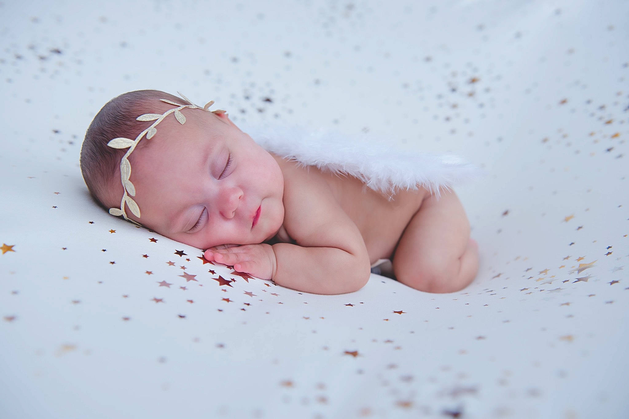 Tessa is registered to the contest to win money with this photo: baby, baby_sleeping, baby_toddler_clothing, bedding, bedtime, child, comfort, eye, fashion_accessory, flesh, foot, fur, linens, nap, pattern, person, portrait_photography, room, sitting, sleep