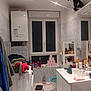 Orion a rejoint le concours — aidez-le/la à gagner de superbes lots ! cat, bathroom, toilet, toilet_paper, sink, mirror, towel, laundry_basket, washing_machine, clothing, tiles, window, step_stool, bottle, cabinet, shelf, lighting, domestic, indoor, clutter