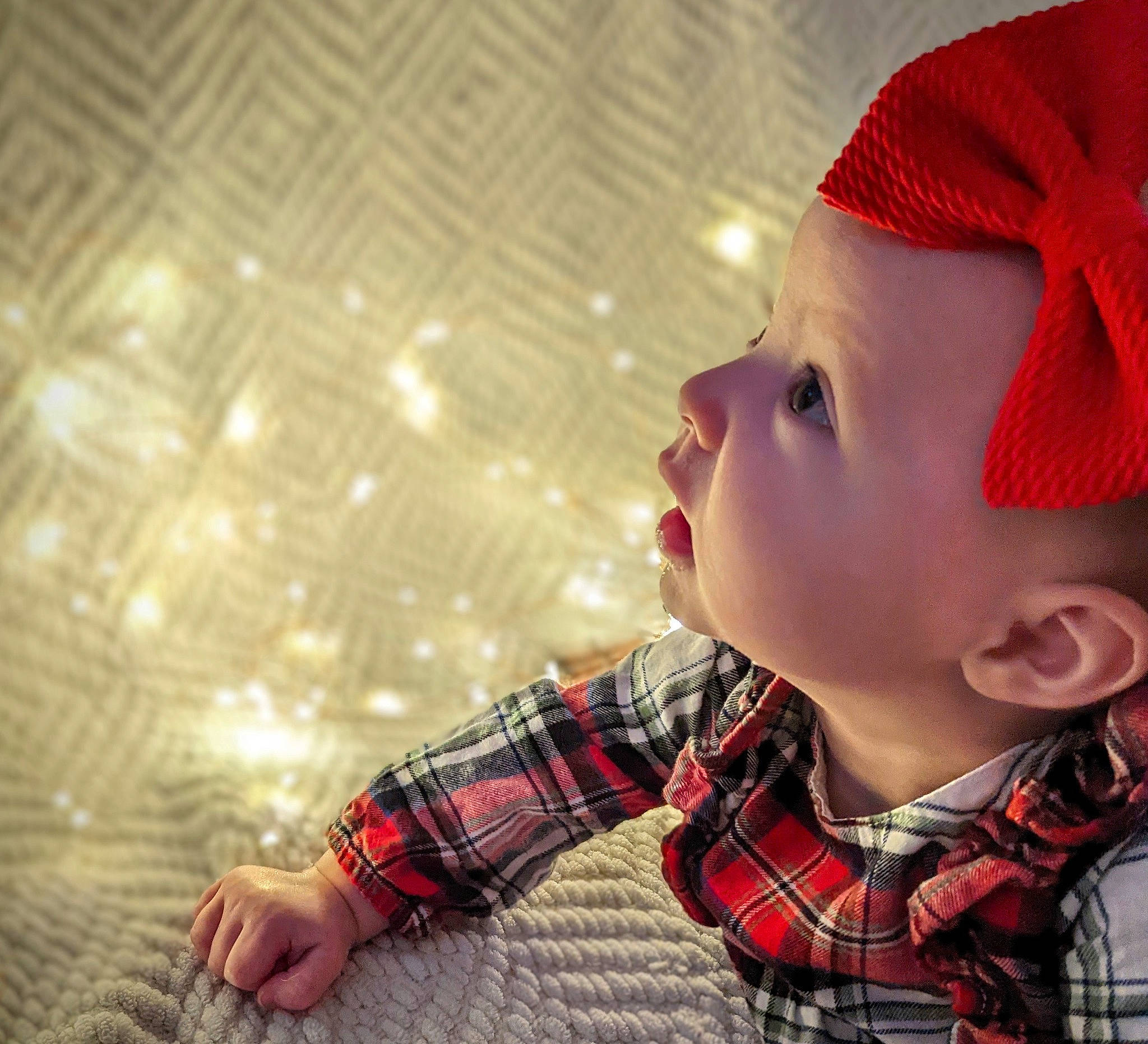 Hannah is registered to the contest to win money with this photo: baby, cap, collar, cool, eye, eyelash, fashion_accessory, flash_photography, flooring, fun, happy, lip, pattern, person, plaid, skin, sleeve, tartan, textile, toddler
