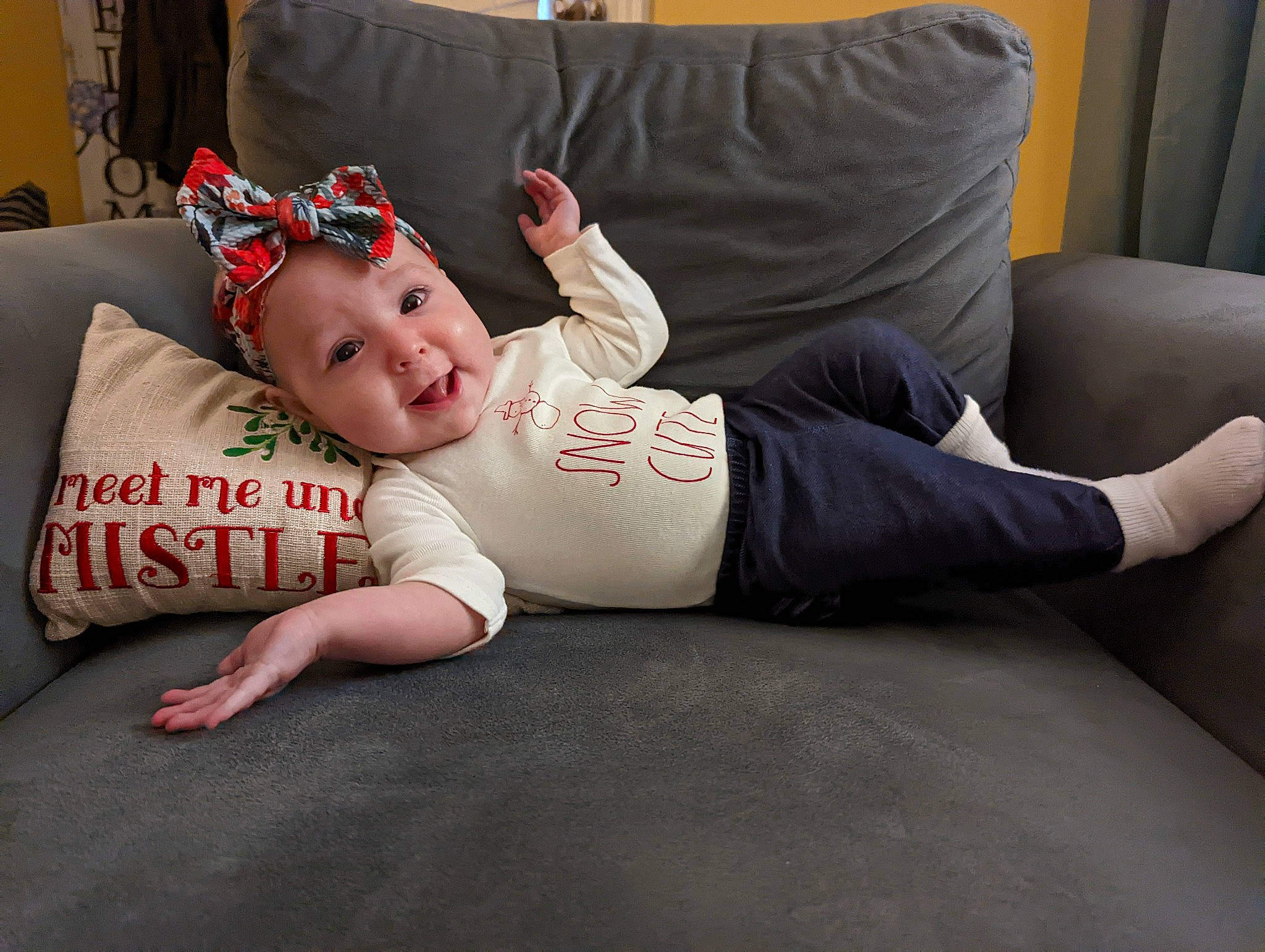 Hannah joined the competition — help win amazing prizes! baby, baby_toddler_clothing, child, comfort, couch, flash_photography, floor, flooring, headwear, human_leg, knee, leg, linens, person, sitting, sleeve, sock, studio_couch, t_shirt, thigh