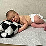newborn, baby, sleeping, diaper, blanket, infant, skin, cute, peaceful, resting, lying_down, soft, cozy, child, toddler, indoor, portrait, newborn_baby, human, sleep