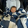 Miles is registered to the contest to win money with this photo: newborn, baby, blanket, car_seat, graco, striped, blue, white, face, infant, child, cozy, resting, serious, young, person, fabric, soft, indoor, portrait