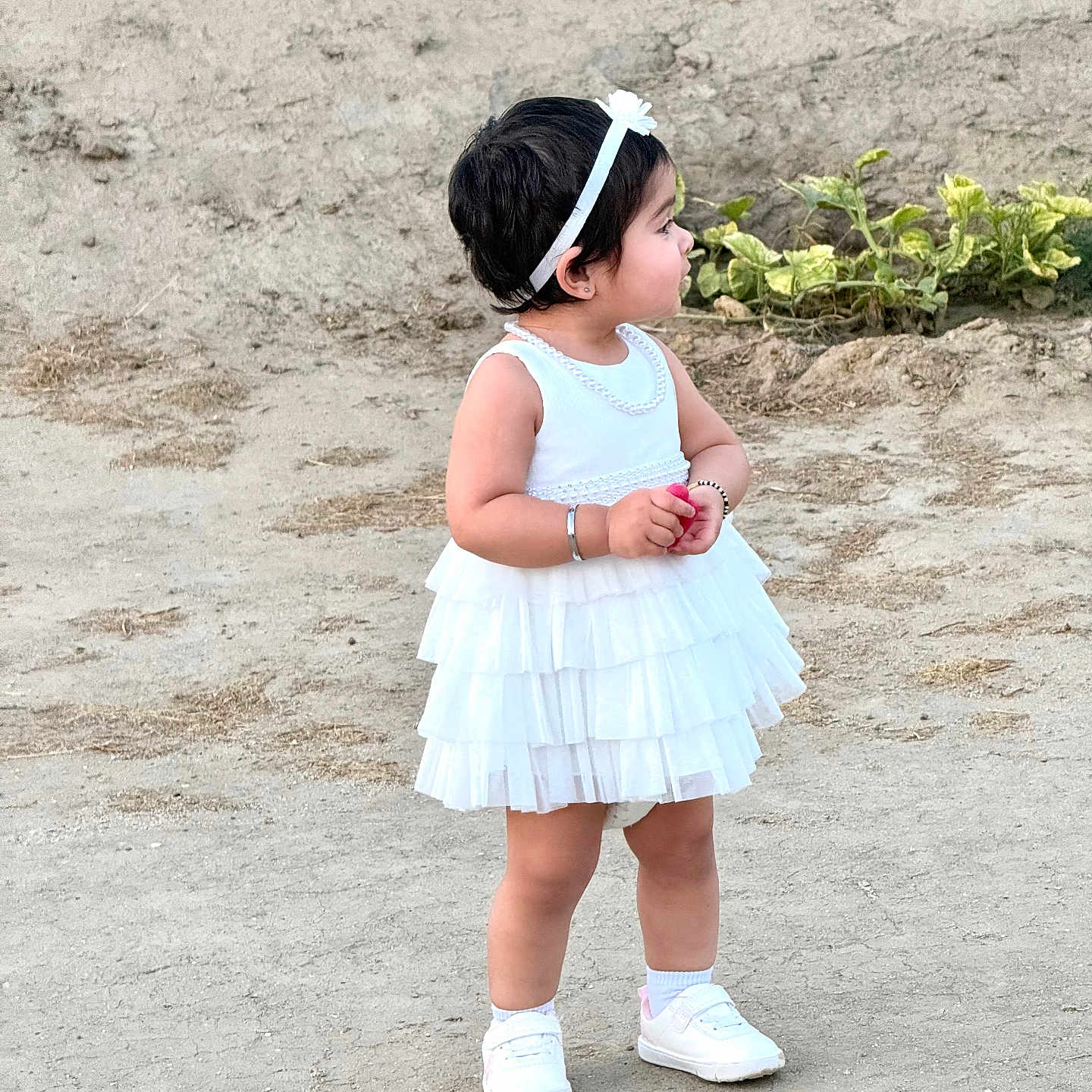 Tehreek joined the competition — help win amazing prizes! casual, child, curious, cute, daylight, earthy_ground, flower, green_plants, headband, innocent, nature, outdoor, person, portrait, small_child, standing, toddler, white_dress, white_sneakers, young