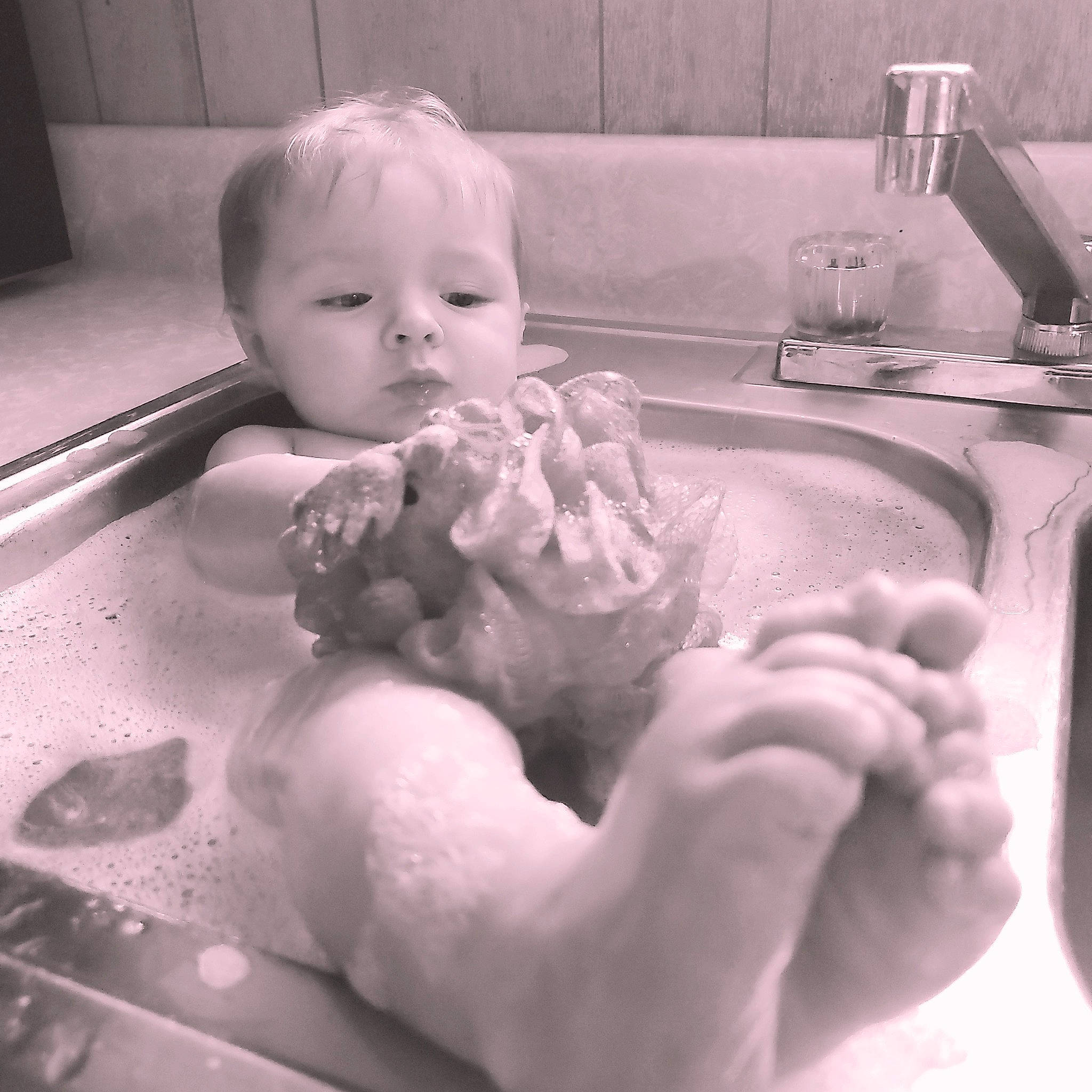 Kylar is registered to the contest to win money with this photo: baby, baby_bathing, birth, black_and_white, child, hand, person, washing