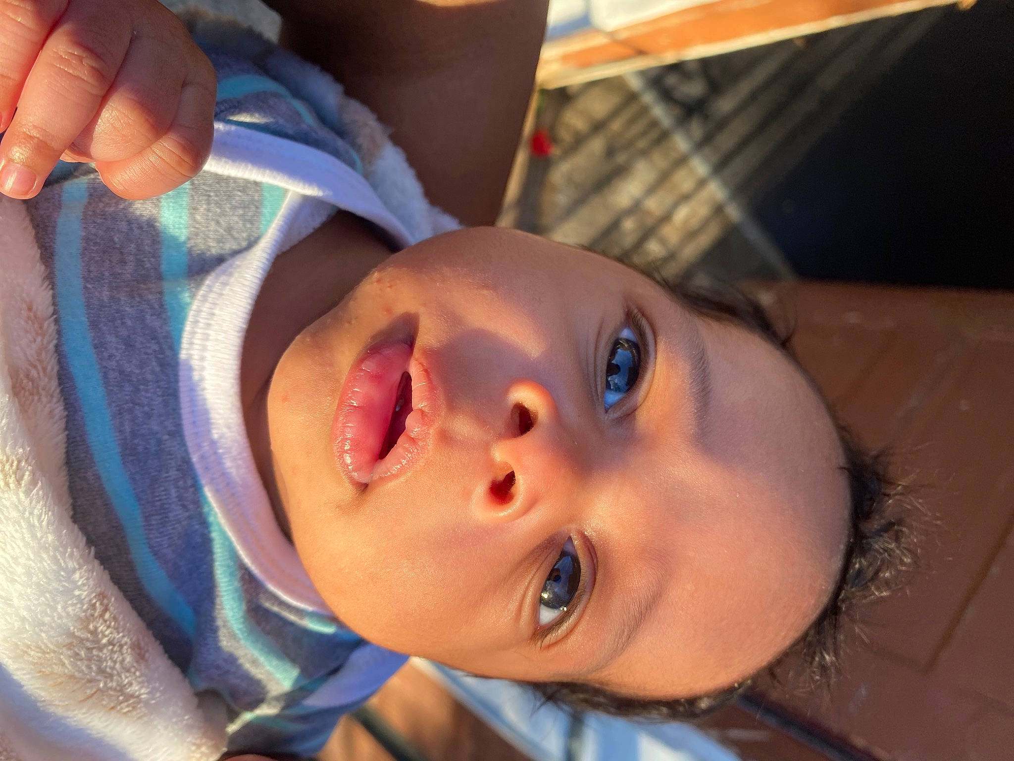 Travis is registered to the contest to win money with this photo: baby, cheek, child, ear, electric_blue, eyelash, fun, happy, hat, headgear, lip, mouth, nail, neck, nose, organ, person, skin, smile, toddler