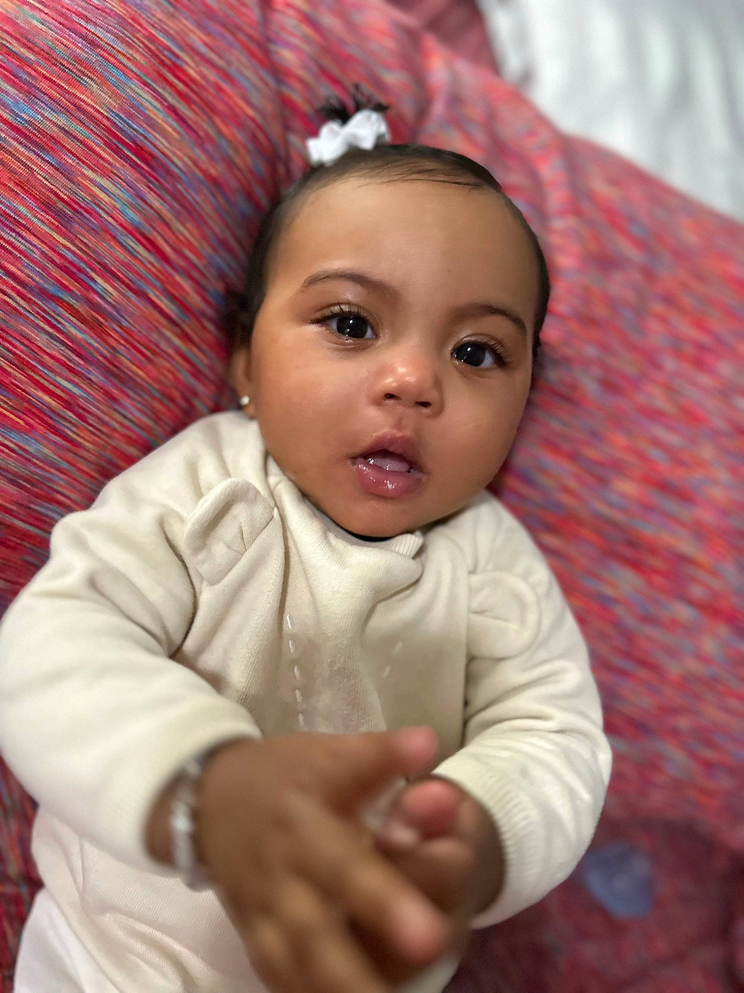 Jaylani joined the competition — help win amazing prizes! baby, baby_toddler_clothing, cheek, child, comfort, flash_photography, gesture, happy, headband, human_body, iris, lip, nose, person, portrait_photography, sitting, sleeve, smile, thumb, toddler