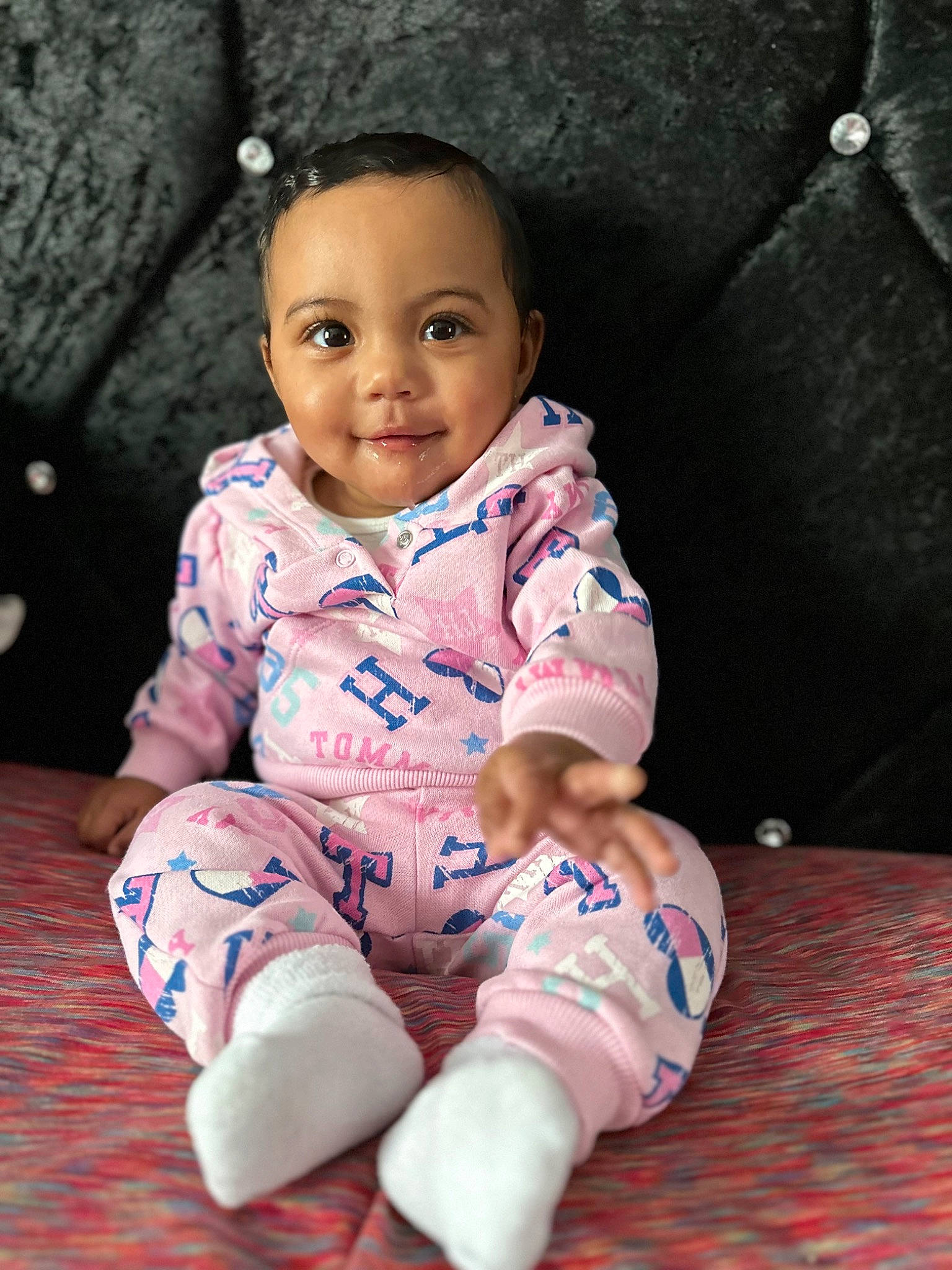 Jaylani joined the competition — help win amazing prizes! arm, baby, baby_toddler_clothing, cheek, chin, eye, face, flash_photography, floor, happy, head, iris, joint, leg, nose, person, pink, skin, sleeve, smile