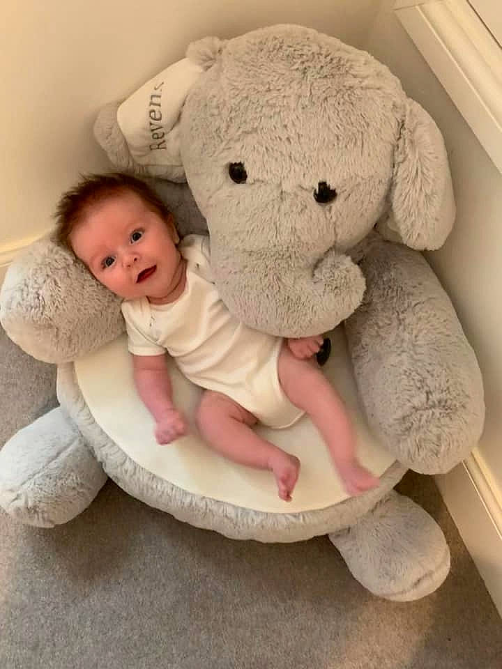 Alistair joined the competition — help win amazing prizes! baby, baby_sleeping, baby_toys, beige, child, elephant, person, pink, plush, product, stuffed_toy, textile, toddler, toy