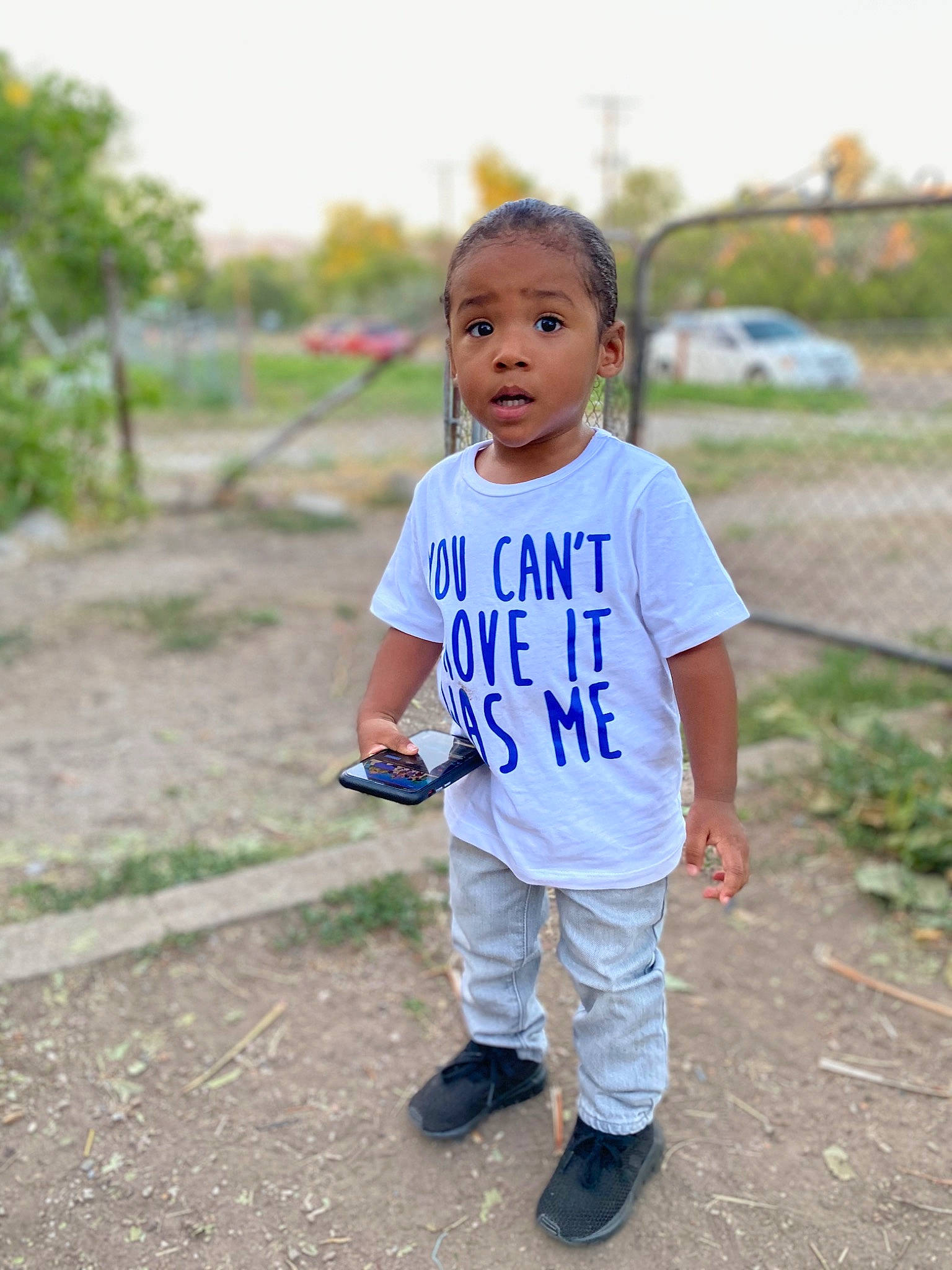 Kalvin joined the competition — help win amazing prizes! blue, child, face, facial_expression, grass, happy, head, people, person, photography, recreation, skin, sleeve, smile, standing, t_shirt, toddler, vacation, walking, white