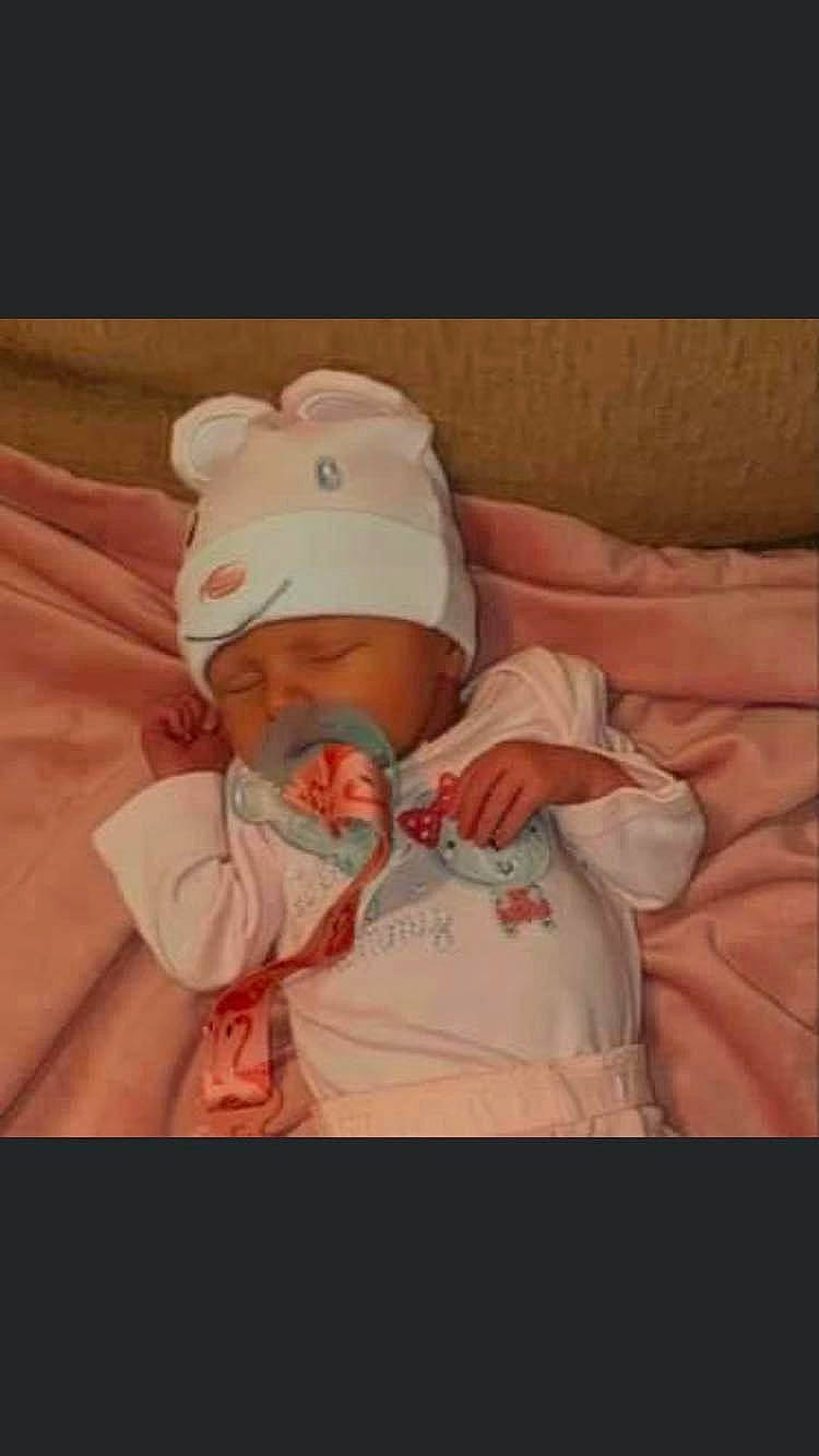 Kinsley Nora Ford joined the competition — help win amazing prizes! abdomen, baby, baby_products, baby_sleeping, baby_toddler_clothing, bedtime, cheek, child, comfort, flesh, happy, hat, headwear, linens, peach, person, room, sitting, skin, sleeve