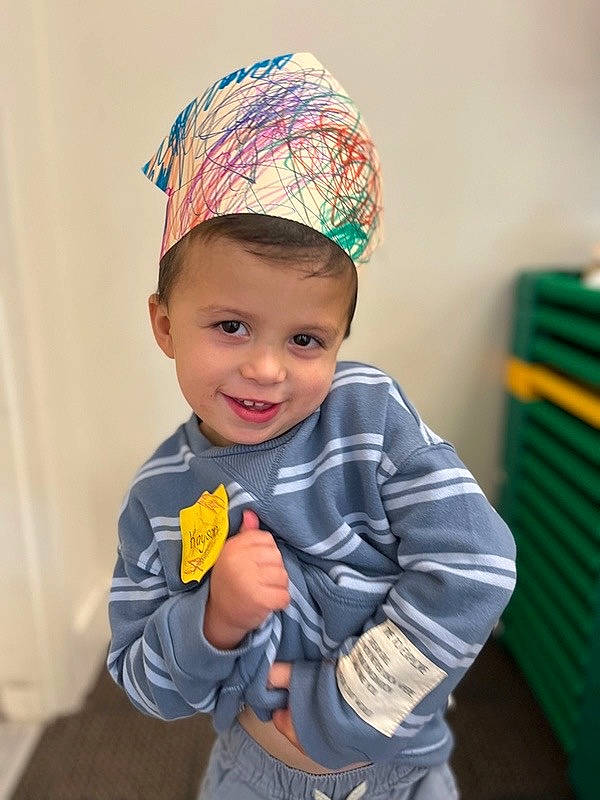 Kayson is registered to the contest to win money with this photo: baby, baby_toddler_clothing, cap, child, clothing, electric_blue, eye, facial_expression, fun, hairstyle, happy, hat, head, headgear, joy, outerwear, person, personal_protective_equipment, sleeve, smile