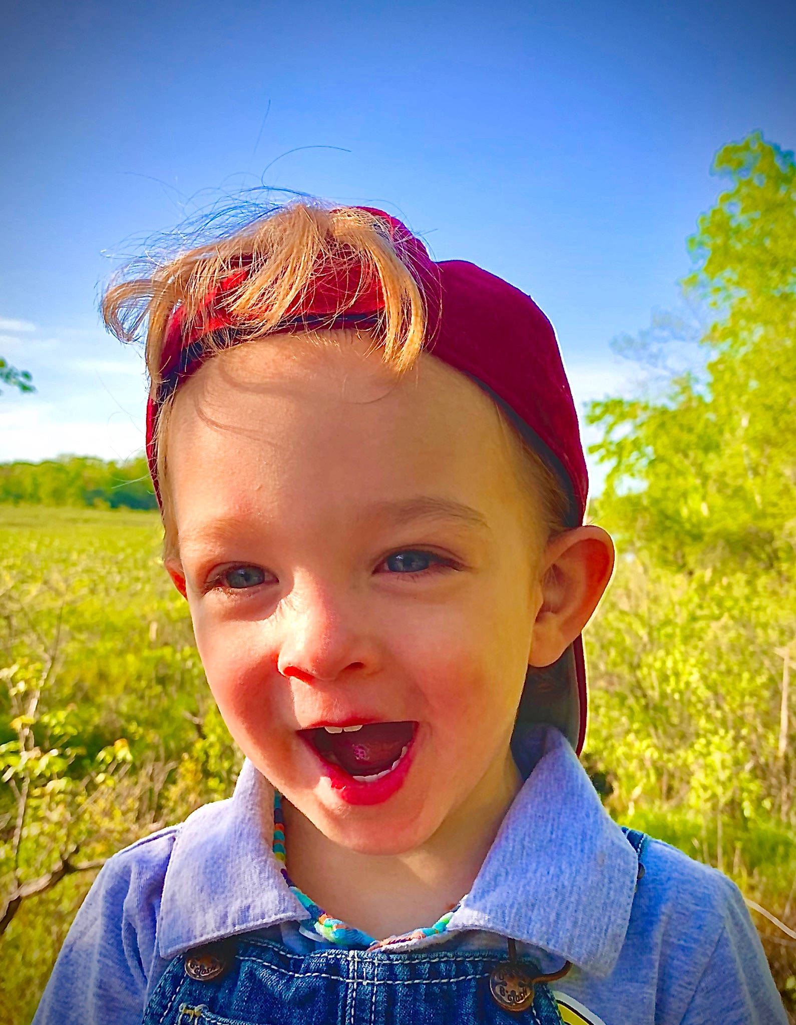 Tristan joined the competition — help win amazing prizes! child, cool, eye, face, facial_expression, forehead, fun, grass, hair, hair_accessory, head, headband, headgear, joy, lip, nose, person, pink, smile, summer