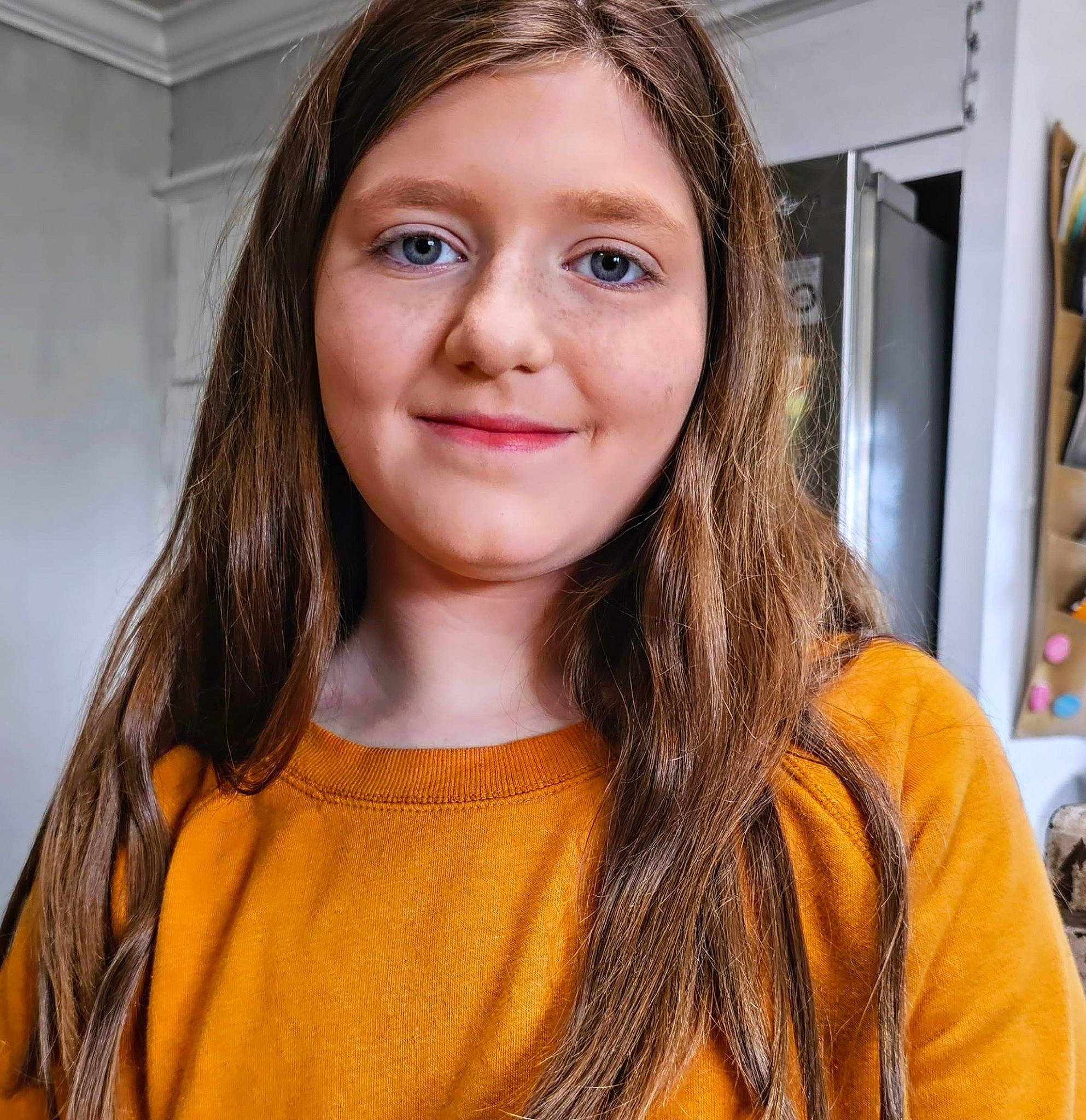 Madison joined the competition — help win amazing prizes! cheek, chin, clothing, eyebrow, eyelash, forehead, happy, iris, jaw, joy, layered_hair, lip, long_hair, neck, nose, orange, outerwear, person, skin, sleeve