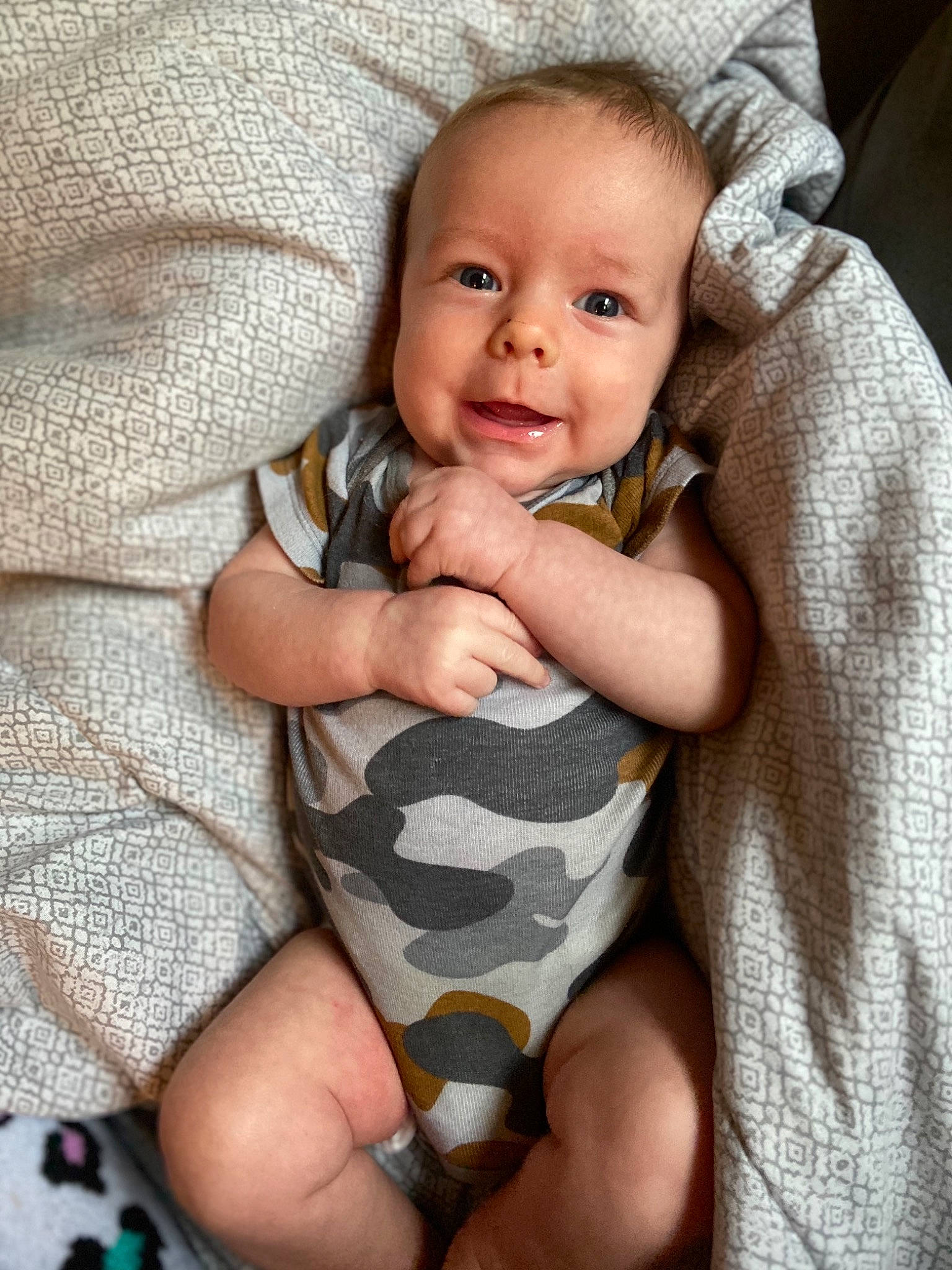 Jaxsom is registered to the contest to win money with this photo: baby, cheek, child, eye, face, facial_expression, finger, hand, head, leg, lip, nose, person, skin, smile, toddler