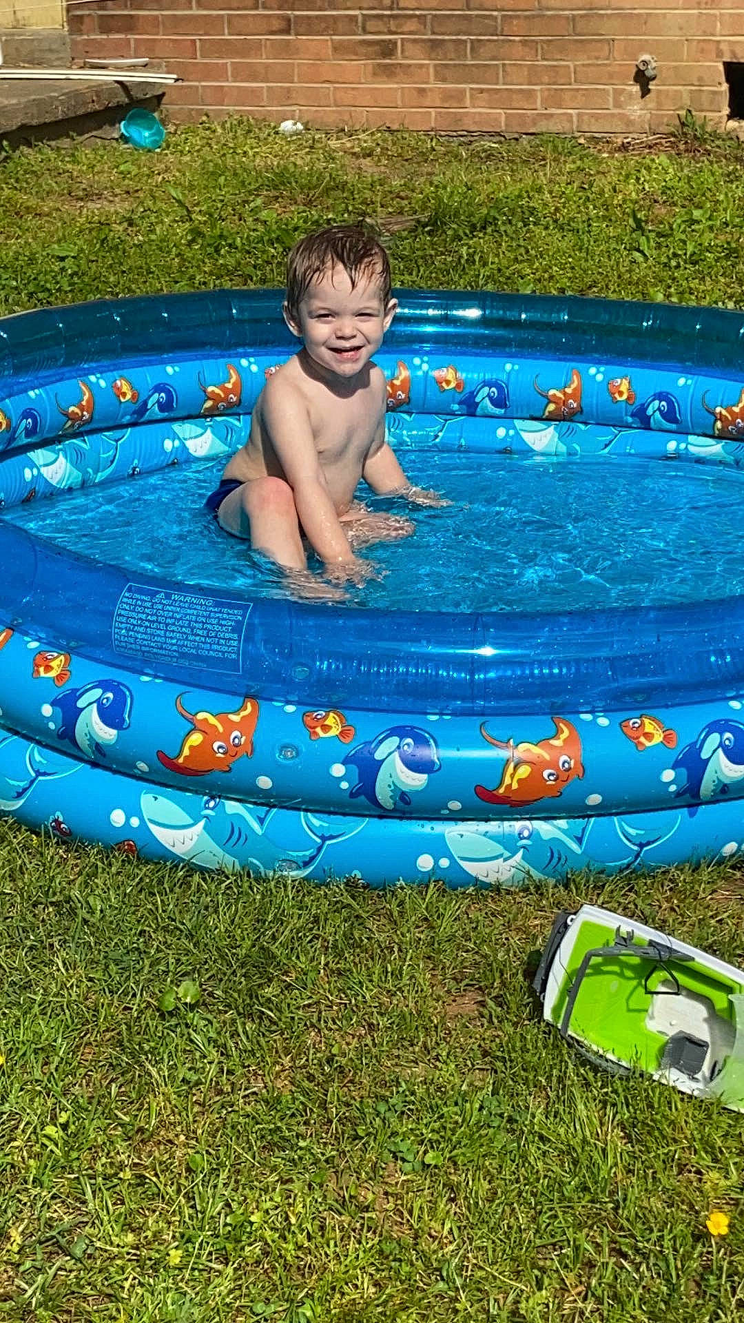 Ethan is registered to the contest to win money with this photo: child, fun, games, inflatable, joy, leisure, person, play, product, recreation, swimming_pool, toddler, toy