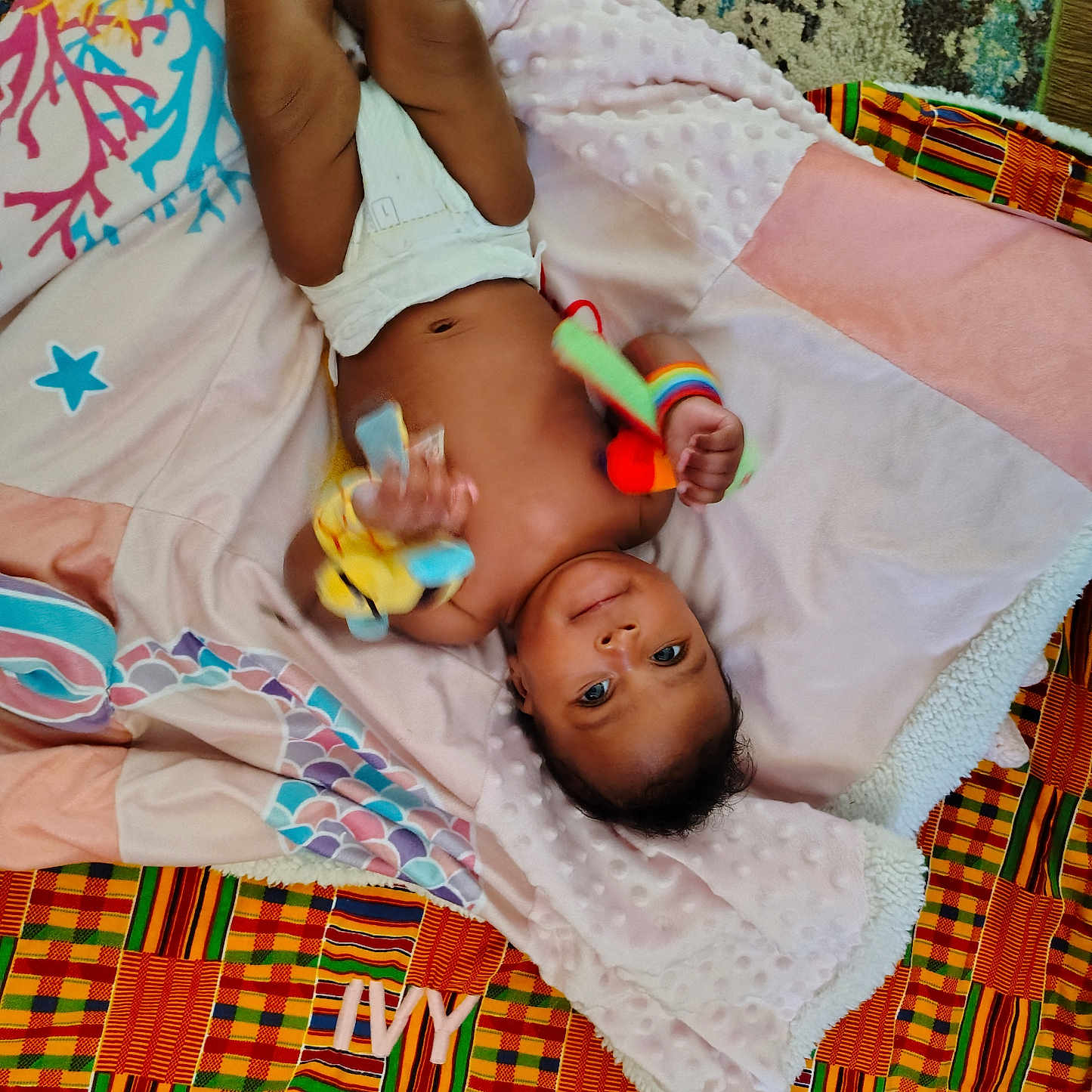 Ivy joined the competition — help win amazing prizes! baby, bed, blanket, bodypart, couch, crib, cushion, diaper, face, finger, furniture, hand, head, homedecor, infantbed, newborn, person, photography, portrait, quilt