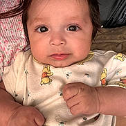 Arthur is registered to the contest to win money with this photo: baby, blanket, child, close_up, clothing, cozy, cute, expression, face, floral, hands, indoors, infant, onesie, portrait, skin, sleepwear, soft, winnie_the_pooh, young