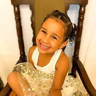 My'Leah is registered to the contest to win money with this photo: baby, baby_toddler_clothing, cheek, chest, child, chin, flash_photography, fun, happy, iris, joy, laugh, neck, person, portrait_photography, room, sitting, sleeveless_shirt, smile, thumb