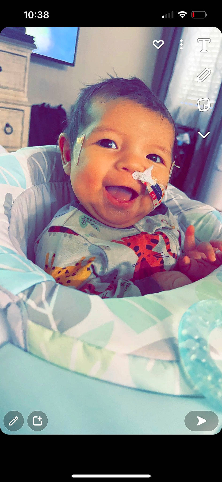 Matteo is registered to the contest to win money with this photo: baby, baby_products, baby_toddler_clothing, cheek, child, comfort, fun, happy, head, iris, laugh, linens, mouth, pattern, person, play, room, sitting, smile, t_shirt