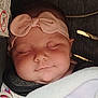 Jade Royal is registered to the contest to win money with this photo: baby, sleeping, headband, bow, blanket, closeup, infant, peaceful, face, child, soft, cute, indoors, resting, pacifier, cozy, adorable, skin, clothing, carseat