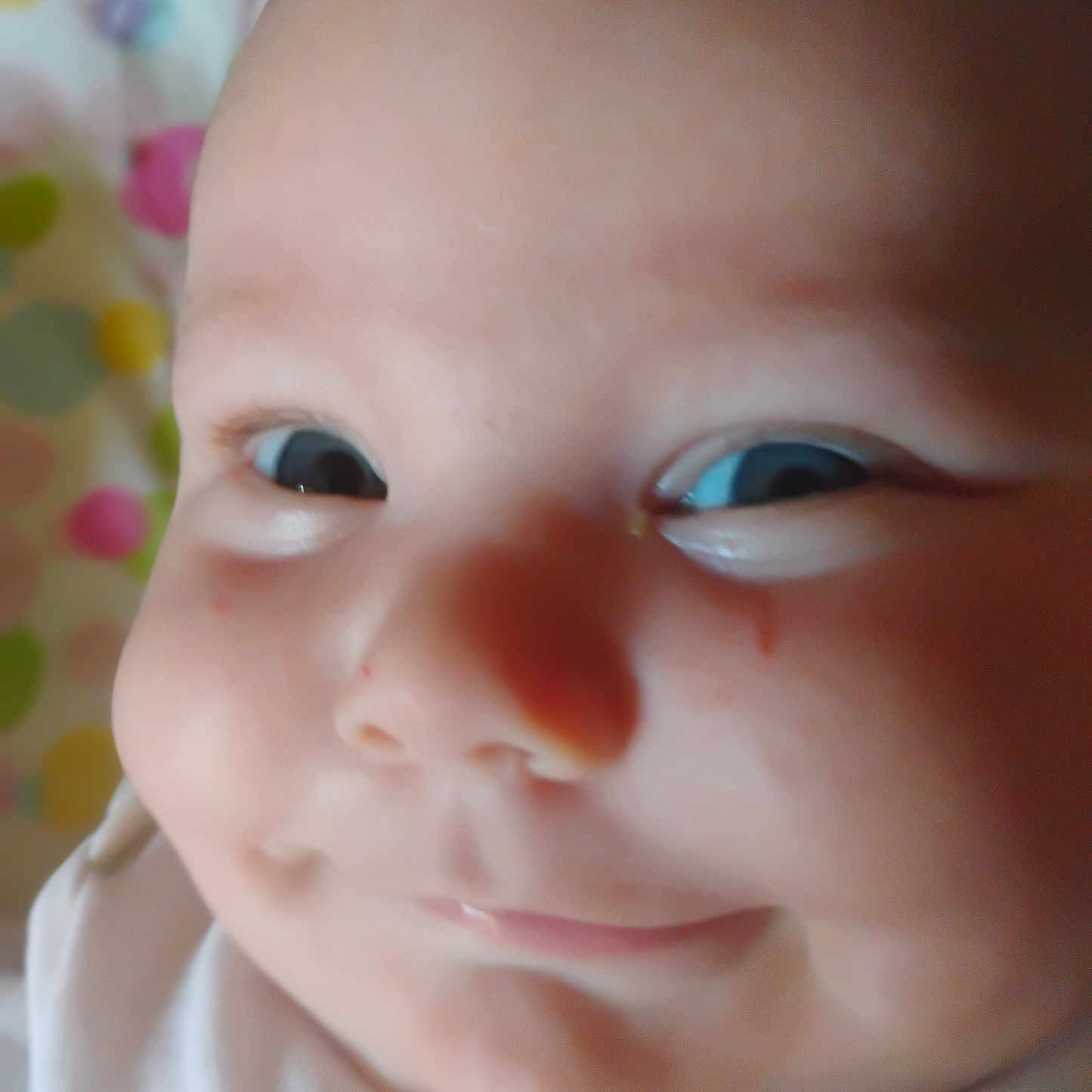 Jade Royal is registered to the contest to win money with this photo: baby, baby_garment, background, cheeks, child, close_up, clothing, cute, expression, eyes, face, happy, head, indoors, infant, person, portrait, skin, smile, young