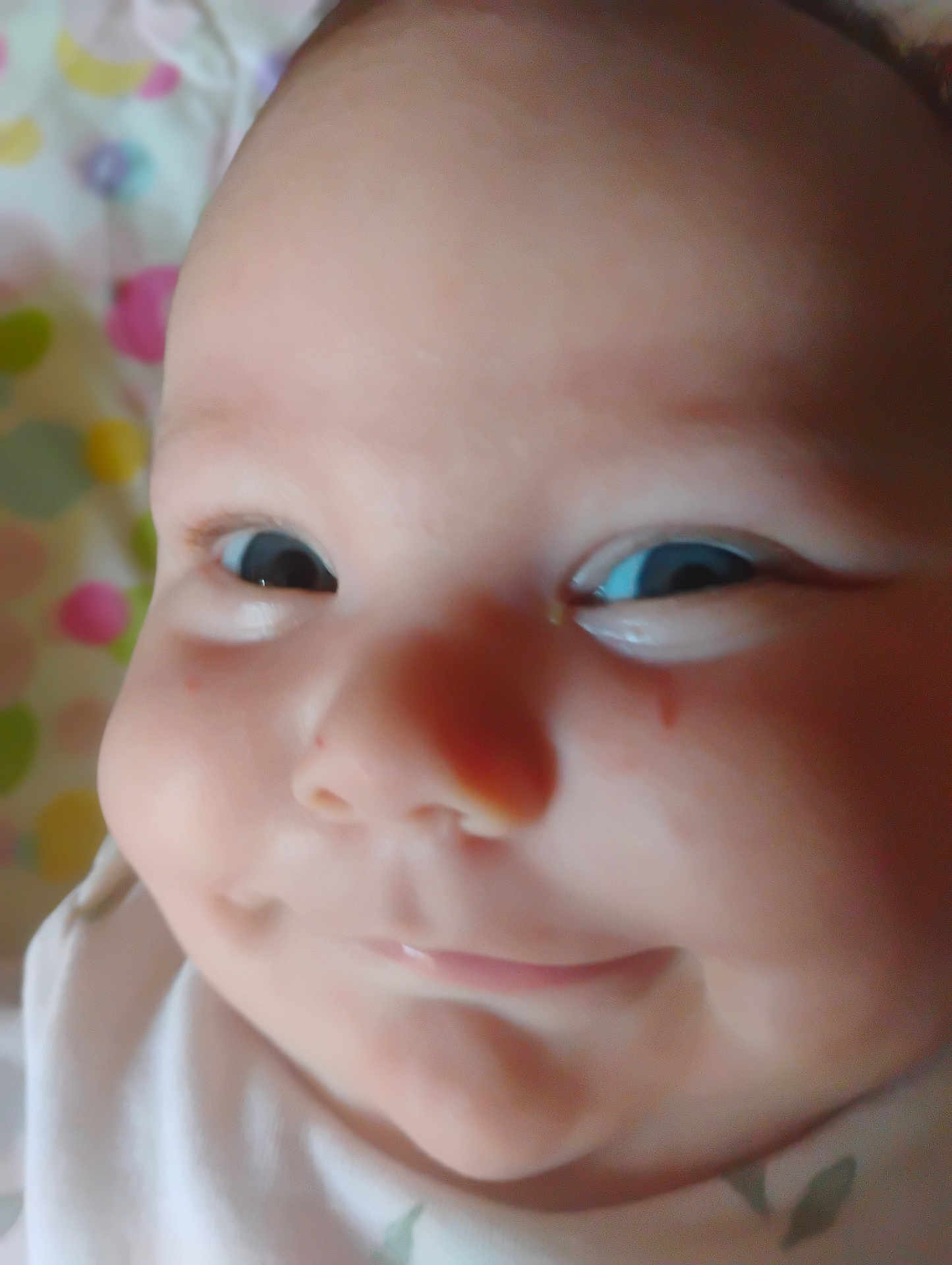 Jade Royal is registered to the contest to win money with this photo: baby, close_up, face, smile, infant, child, skin, eyes, cheeks, portrait, cute, expression, young, head, person, clothing, indoors, happy, baby_garment, background