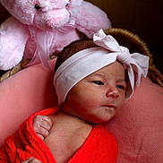 Oaklynn joined the competition — help win amazing prizes! newborn, baby, infant, pink_bear, plush_toy, headband, blanket, red_cloth, cushion, basket, soft_toy, portrait, cute, indoors, child, sleepy, wrapped, baby_clothes, teddy_bear, baby_boy