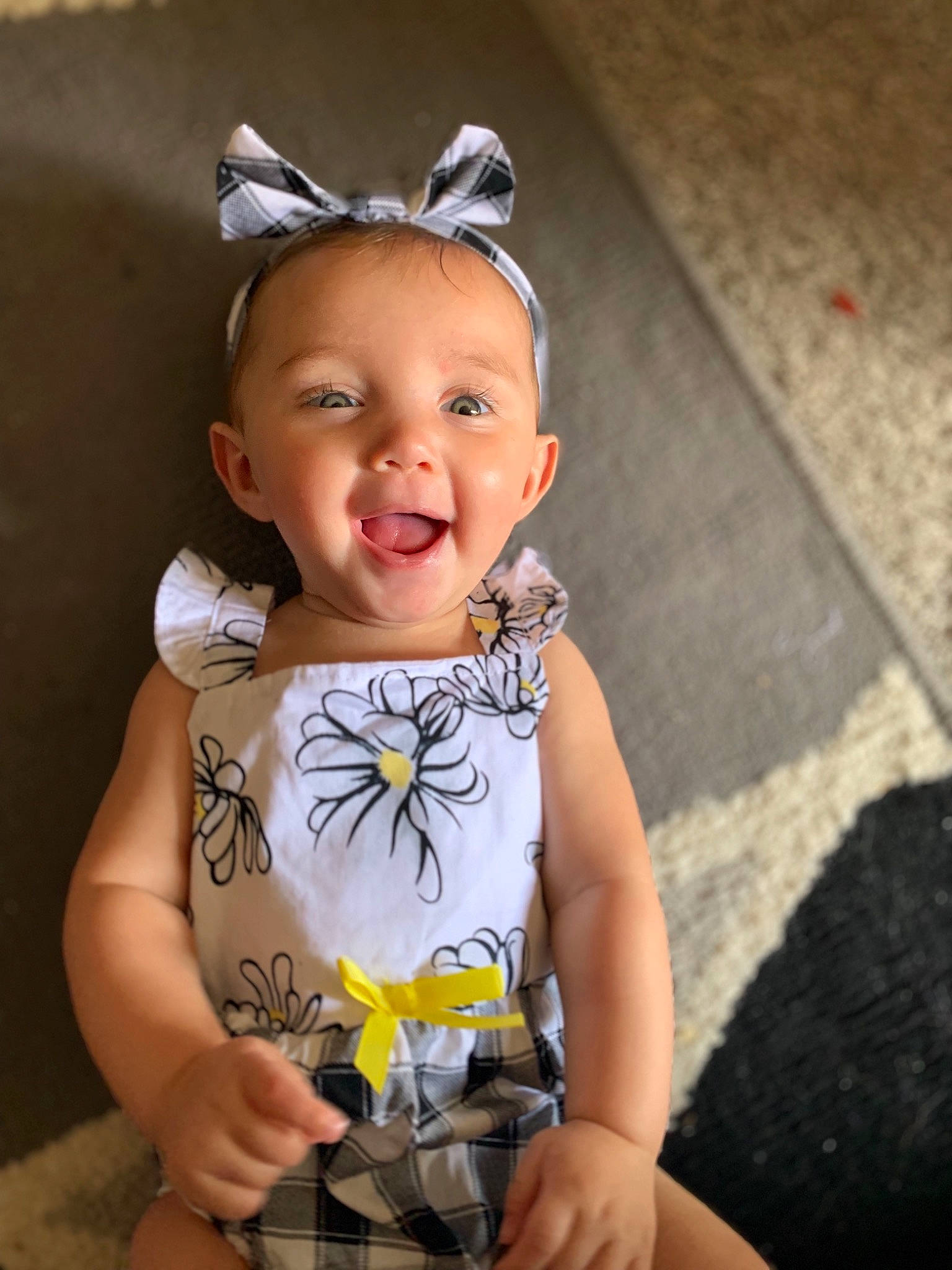 Aubrielle joined the competition — help win amazing prizes! baby, baby_products, baby_toddler_clothing, child, child_model, dress, ear, fashion_accessory, flower, hair_accessory, happy, head, headband, headgear, headpiece, iris, pattern, person, smile, toddler