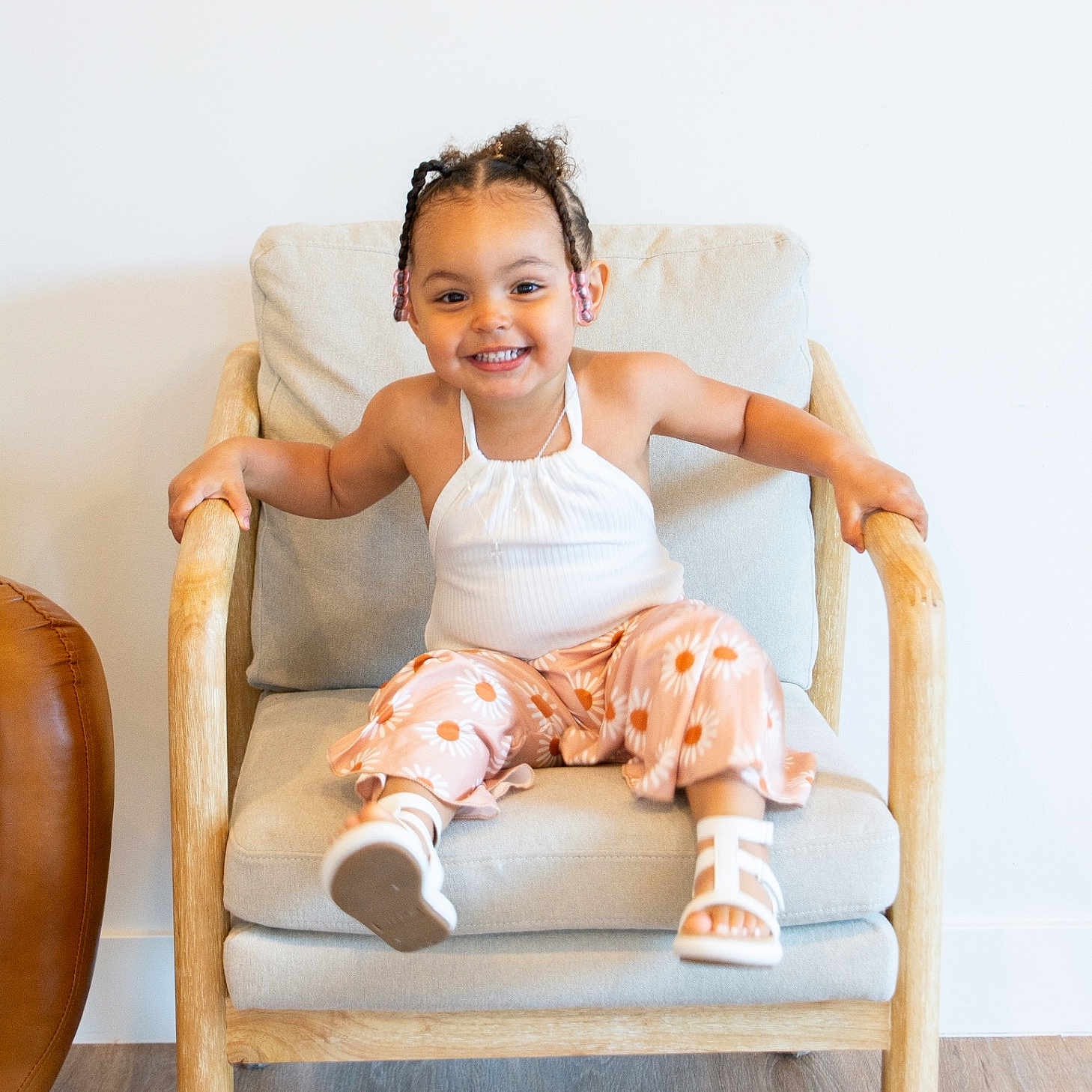 Azariah is registered to the contest to win money with this photo: armchair, chair, child, clothing, cushion, face, female, furniture, girl, happy, head, homedecor, pajamas, pants, person, photography, portrait, rockingchair, sitting, smile