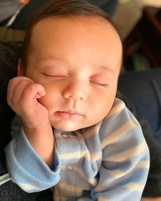 Bryce is registered to the contest to win money with this photo: baby, beauty, cheek, child, chin, ear, eye, face, finger, forehead, hand, head, lip, mouth, nose, person, skin, smile, toddler