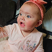 Delilah-Rose joined the competition — help win amazing prizes! baby, child, infant, headband, pink_dress, bunny_ears, cute, surprised, indoor, stroller, clothing, portrait, expression, face, person, young, sitting, curious, soft_lighting, decor