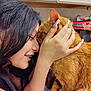 affection, black_hair, braces, cat, close_up, countertop, cute, domestic, face_touching, feline, gentle, human_animal_interaction, indoor, kitchen, long_nails, love, orange_tabby, pet, smile, woman