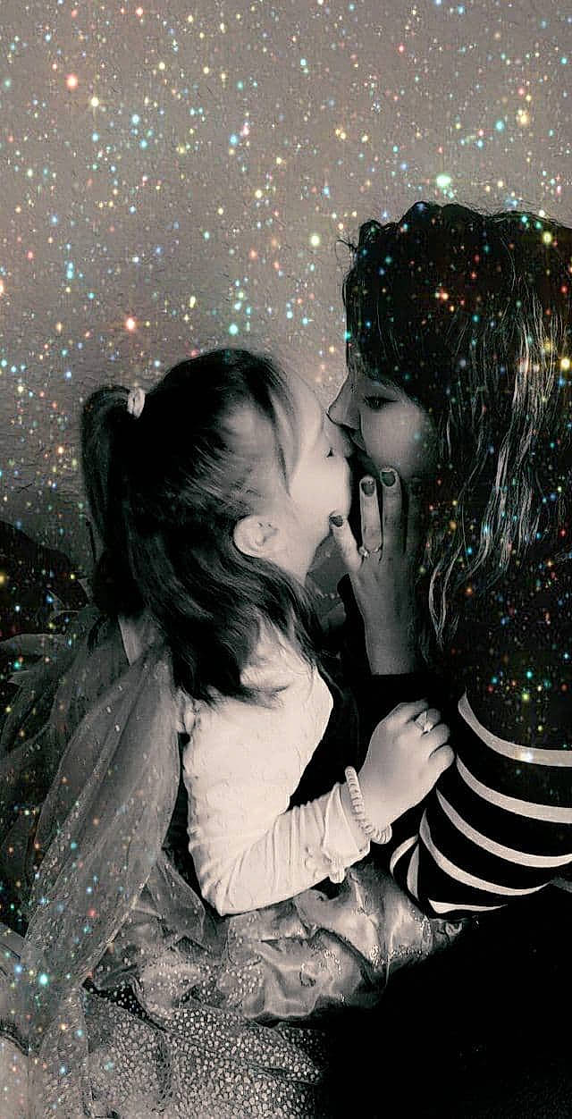 Léanna participe au concours pour gagner de l'argent avec cette photo : black_hair, child, christmas_ornament, event, facial_expression, flash_photography, friendship, fun, gesture, hairstyle, happy, hug, interaction, jewellery, love, monochrome_photography, party_supply, people_in_nature, person, romance