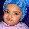 Maelynn is registered to the contest to win money with this photo: baby, child, infant, portrait, face, eyes, looking_at_camera, serious_expression, blue, bunny_hood, plush, hooded_outfit, lavender_clothing, indoor, close_up, flash_photography, headshot, cute, sitting, safe