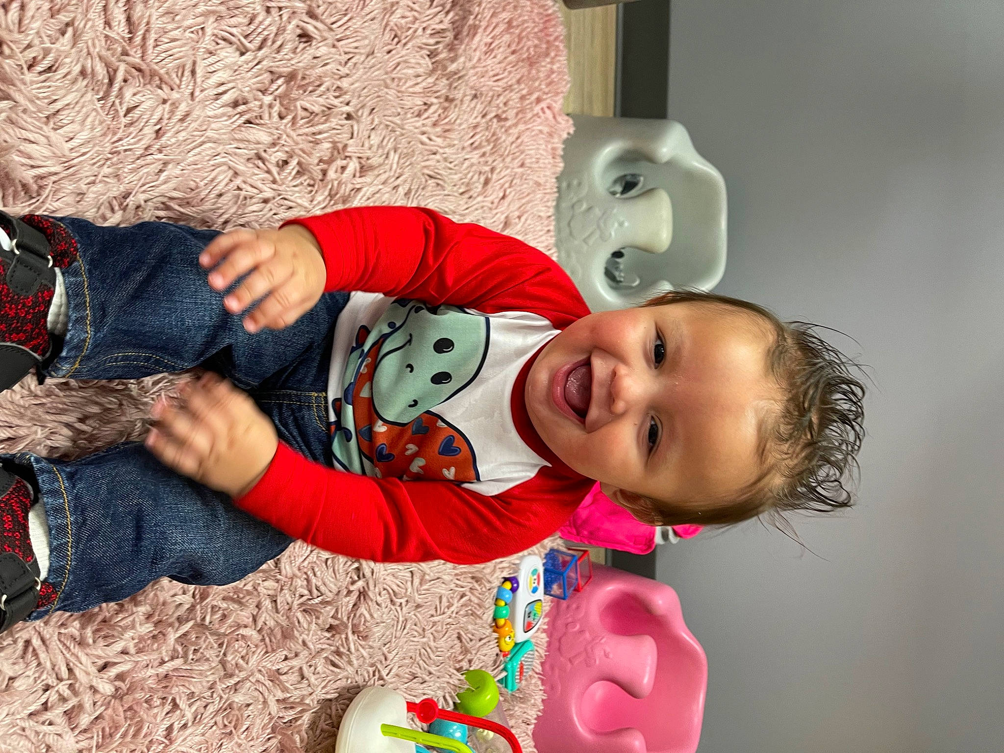 Julian is registered to the contest to win money with this photo: baby, baby_toddler_clothing, child, event, fun, happy, hat, holiday, laugh, pattern, person, play, room, sitting, sleeve, smile, toddler, tradition, tree, wood