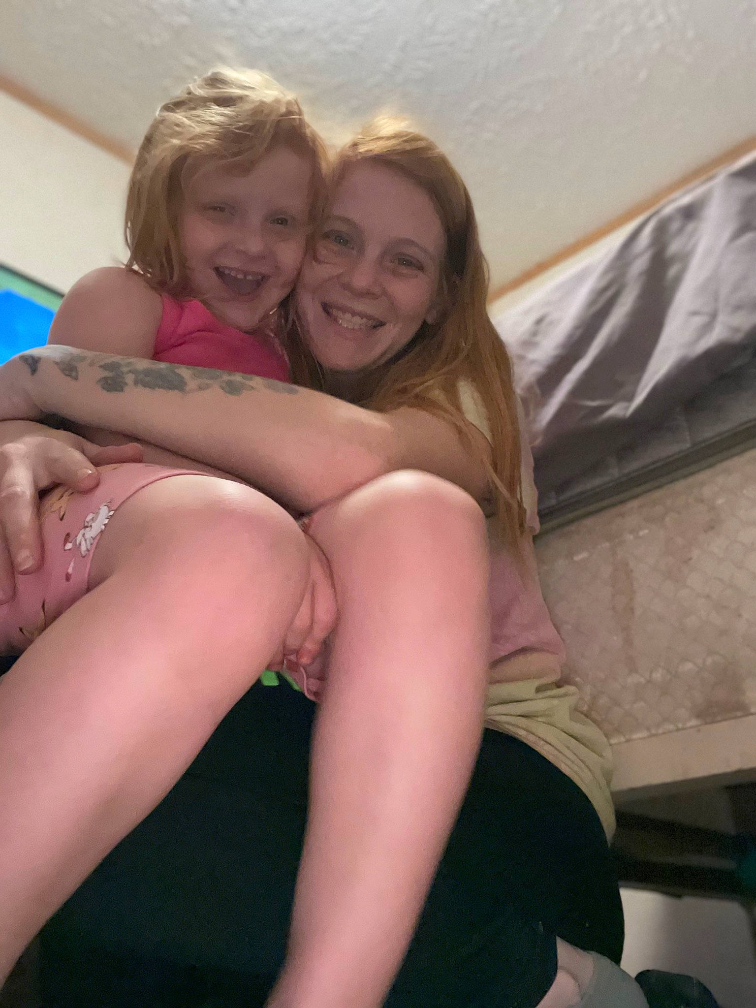 Brylee is registered to the contest to win money with this photo: arm, comfort, finger, flash_photography, gesture, happy, head, human_body, joint, joy, knee, leg, leisure, long_hair, mouth, muscle, neck, person, shorts, shoulder