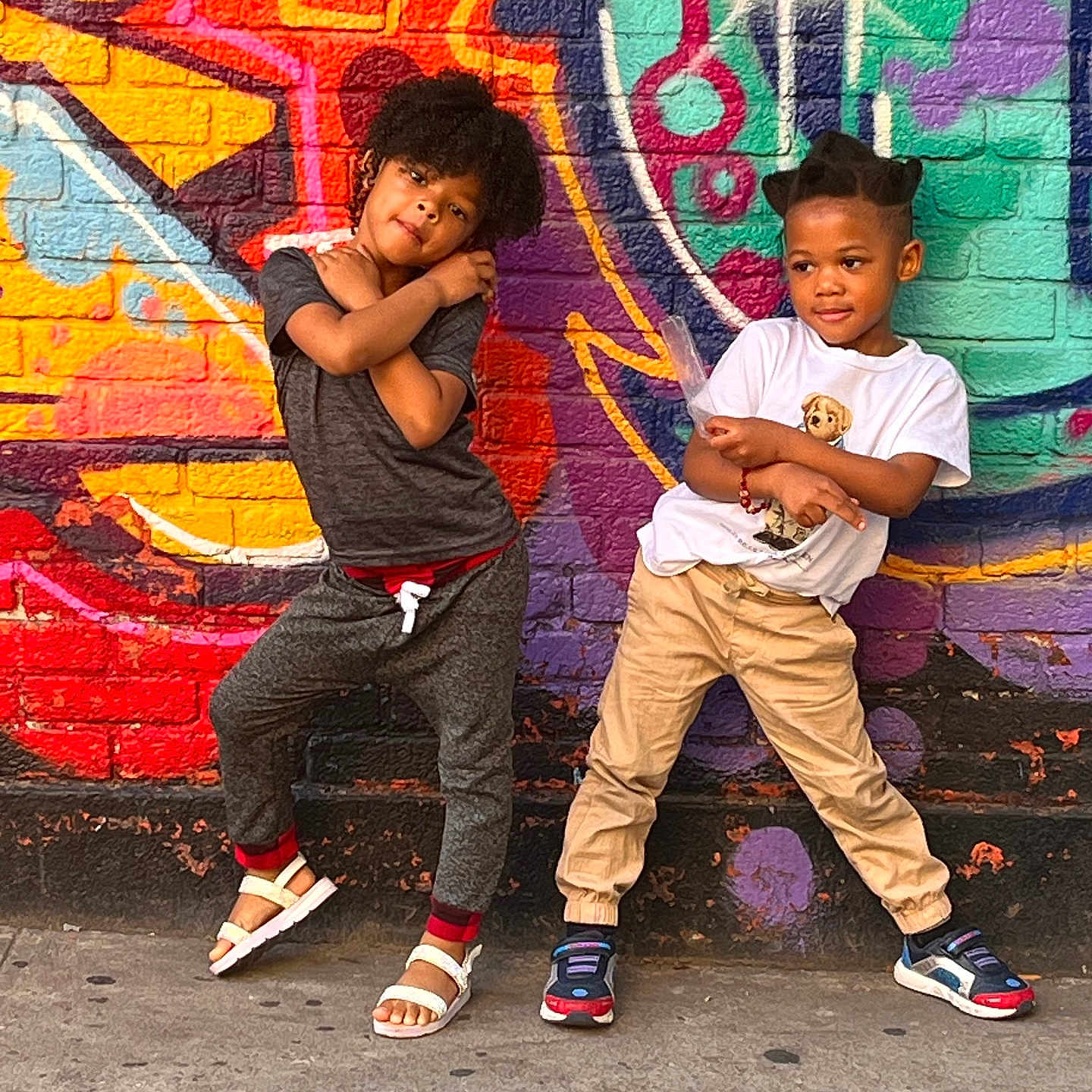 Orieena is registered to the contest to win money with this photo: art, boy, child, city, clothing, face, footwear, hair, head, male, pants, people, person, photography, portrait, road, sandal, shoe, street, urban