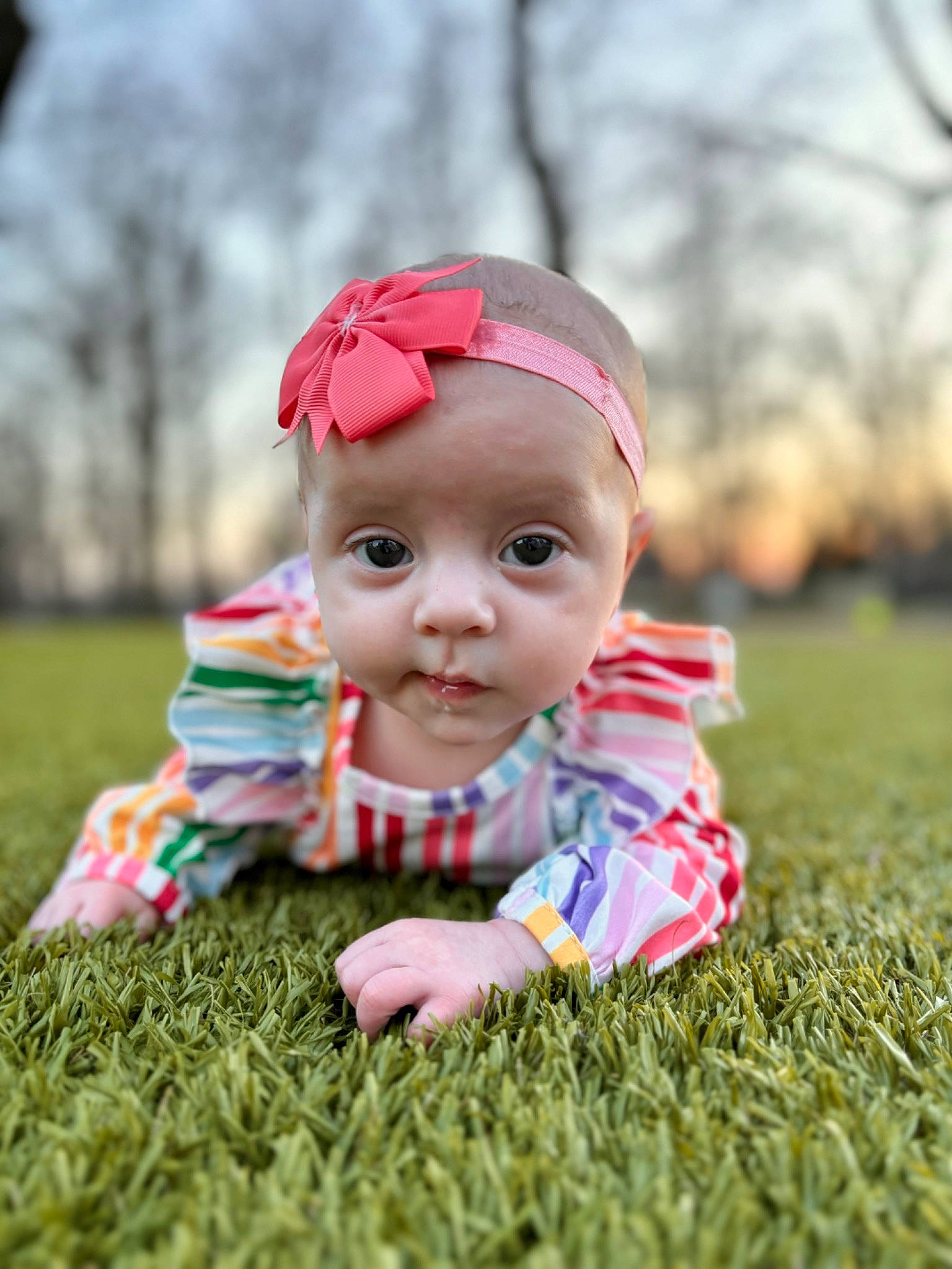 Iris is registered to the contest to win money with this photo: autumn, baby, baby_toddler_clothing, cap, child, face, fun, grass, grassland, happy, hat, headwear, leisure, people_in_nature, person, plant, portrait_photography, recreation, sitting, sky