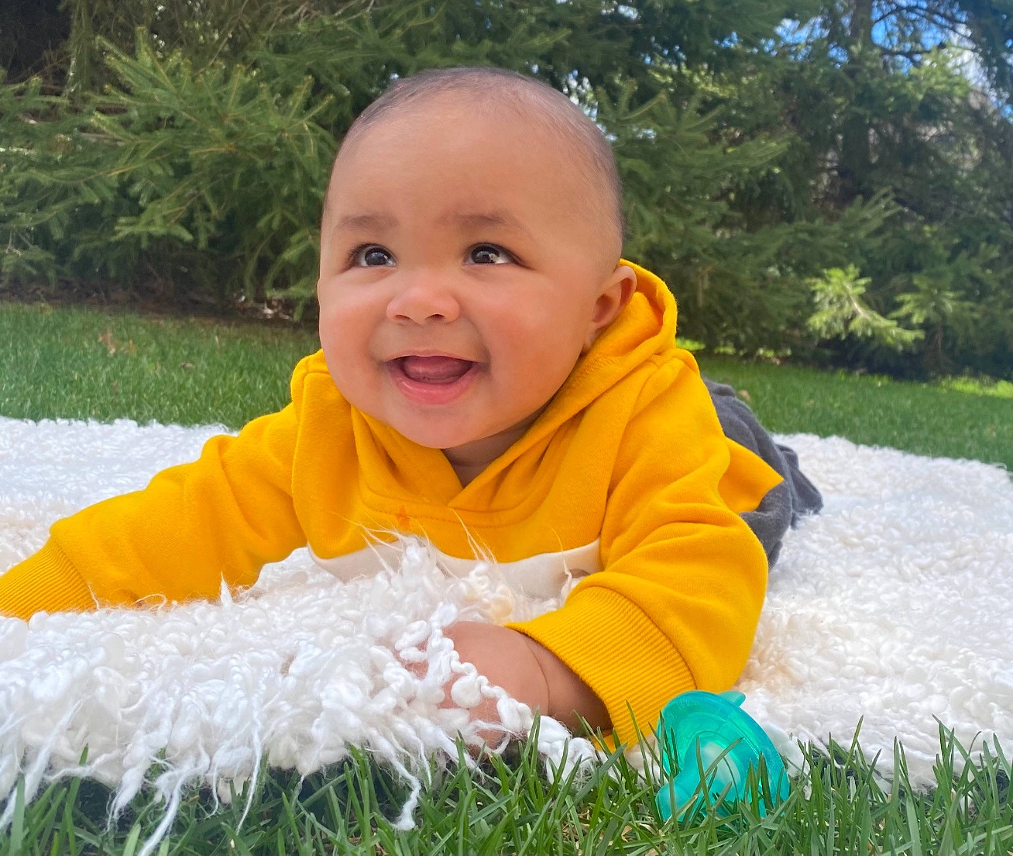 Roman is registered to the contest to win money with this photo: baby, baby_laughing, baby_products, baby_toddler_clothing, child, fun, grass, happy, head, joy, leaf, leisure, people_in_nature, person, plant, play, sitting, smile, t_shirt, toddler