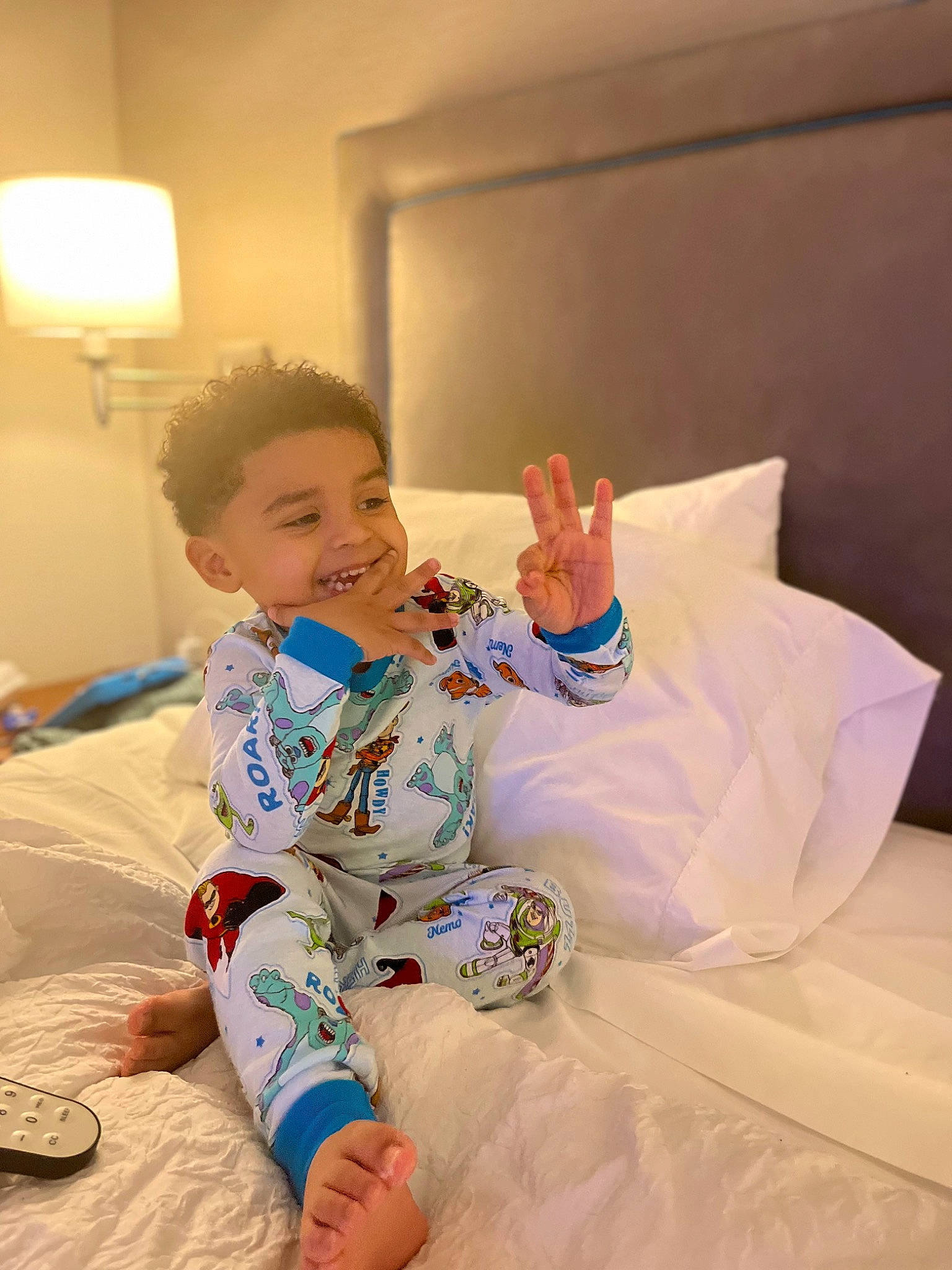 Yehezquiel joined the competition — help win amazing prizes! baby, baby_toddler_clothing, child, comfort, dress, flooring, foot, fun, hair, happy, joy, lamp, linens, person, room, shirt, sitting, sleeve, smile, t_shirt