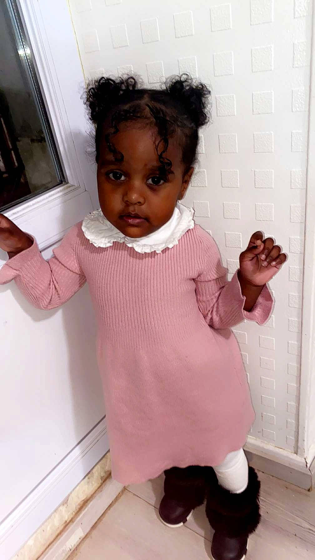 Daryanna participe au concours pour gagner de l'argent avec cette photo : baby, baby_toddler_clothing, cheek, child, eyelash, foot, gesture, human_leg, knee, magenta, pattern, person, pink, room, sitting, skin, sleeve, sock, standing, thumb