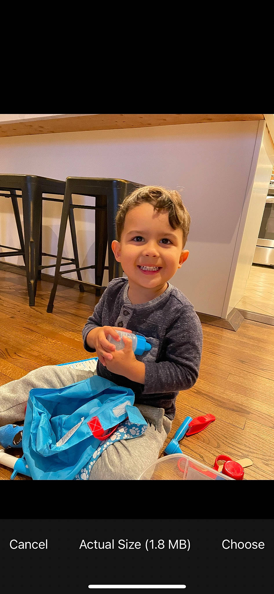 Ezra Acedo is registered to the contest to win money with this photo: baby, baby_toddler_clothing, child, electric_blue, event, flooring, fun, happy, hardwood, joy, leisure, person, room, sitting, skin, sleeve, smile, t_shirt, toddler, varnish