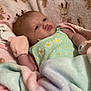 Amelia joined the competition — help win amazing prizes! baby, blanket, pajamas, infant, giraffe_pattern, soft_toys, sleepwear, cozy, cute, child, face, lying_down, pastel_colors, fabric, home, comfort, newborn, small_hands, wrapped, portrait