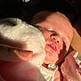 Amelia is registered to the contest to win money with this photo: baby, infant, face, hand, cloth, mitten, light, shadow, skin, sleeping, closeup, person, newborn, cute, soft, warm, rest, care, tender, innocence
